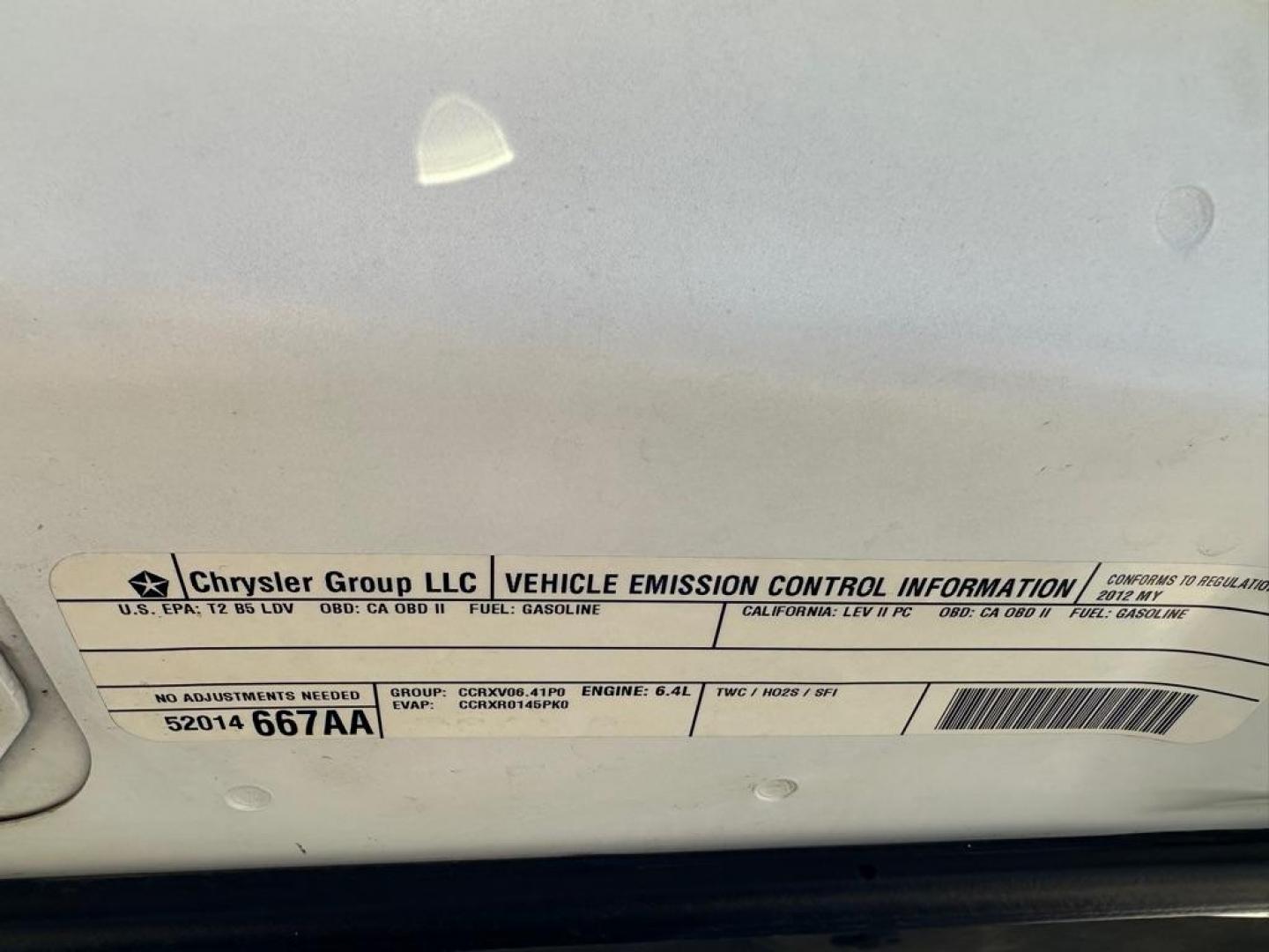 2012 WHITE CHRYSLER 300 SRT-8 (2C3CCAFJ5CH) with an 6.4L engine, Automatic transmission, located at 1030 S. 22nd St., Bismarck, ND, 58504, (701) 258-0022, 46.793560, -100.758118 - 6.4 Liter SRT-8 YELLOW BRAKE CALIBER COVERS-AUTO - Photo#14