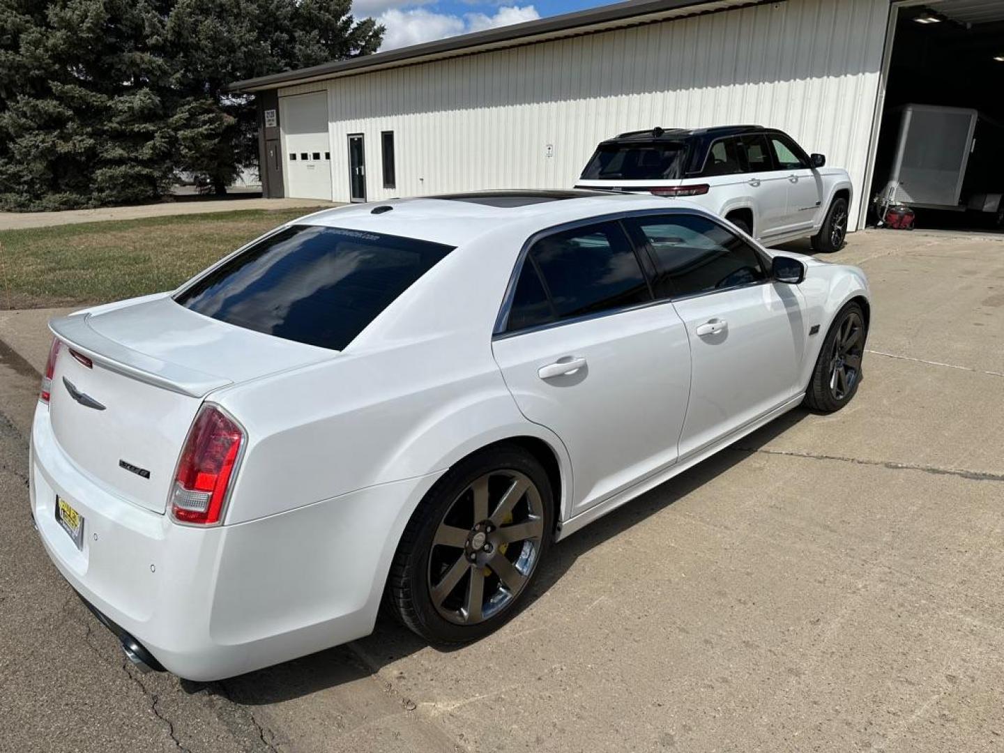 2012 WHITE CHRYSLER 300 SRT-8 (2C3CCAFJ5CH) with an 6.4L engine, Automatic transmission, located at 1030 S. 22nd St., Bismarck, ND, 58504, (701) 258-0022, 46.793560, -100.758118 - 6.4 Liter SRT-8 YELLOW BRAKE CALIBER COVERS-AUTO - Photo#4