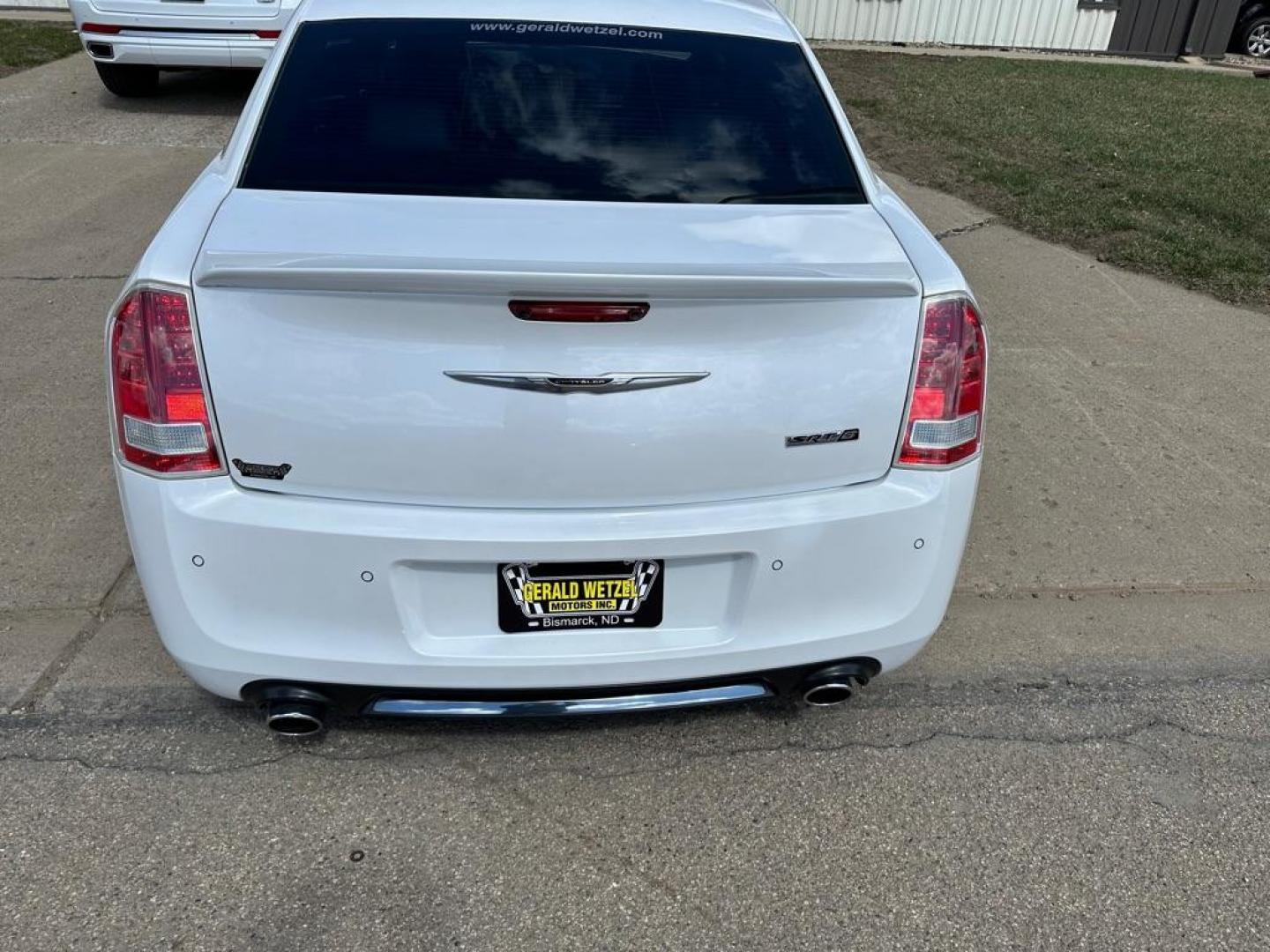 2012 WHITE CHRYSLER 300 SRT-8 (2C3CCAFJ5CH) with an 6.4L engine, Automatic transmission, located at 1030 S. 22nd St., Bismarck, ND, 58504, (701) 258-0022, 46.793560, -100.758118 - 6.4 Liter SRT-8 YELLOW BRAKE CALIBER COVERS-AUTO - Photo#5