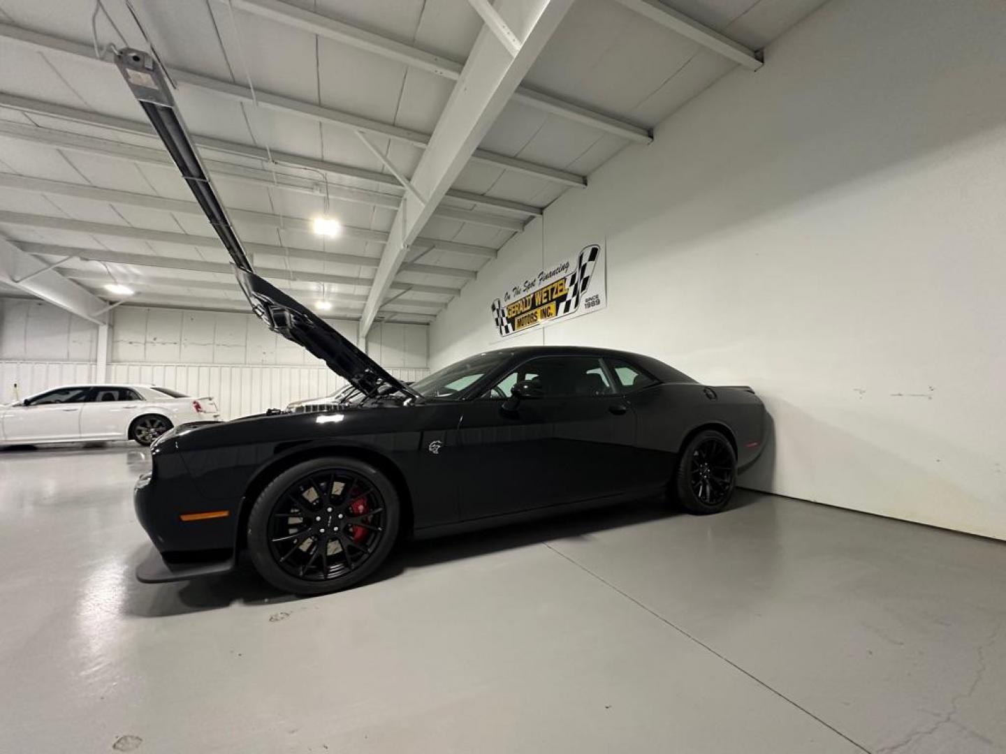 2015 BLACK DODGE CHALLENGER SRT HELLCAT (2C3CDZC94FH) with an 6.2L engine, 6-Speed Manual transmission, located at 1030 S. 22nd St., Bismarck, ND, 58504, (701) 258-0022, 46.793560, -100.758118 - ACTUAL MILES 1375. SRT 8 HELLCAT SUPER CHARGED, AUTO 704 HP. LIKE NEW. GREAT INVESTMENT. - Photo#5