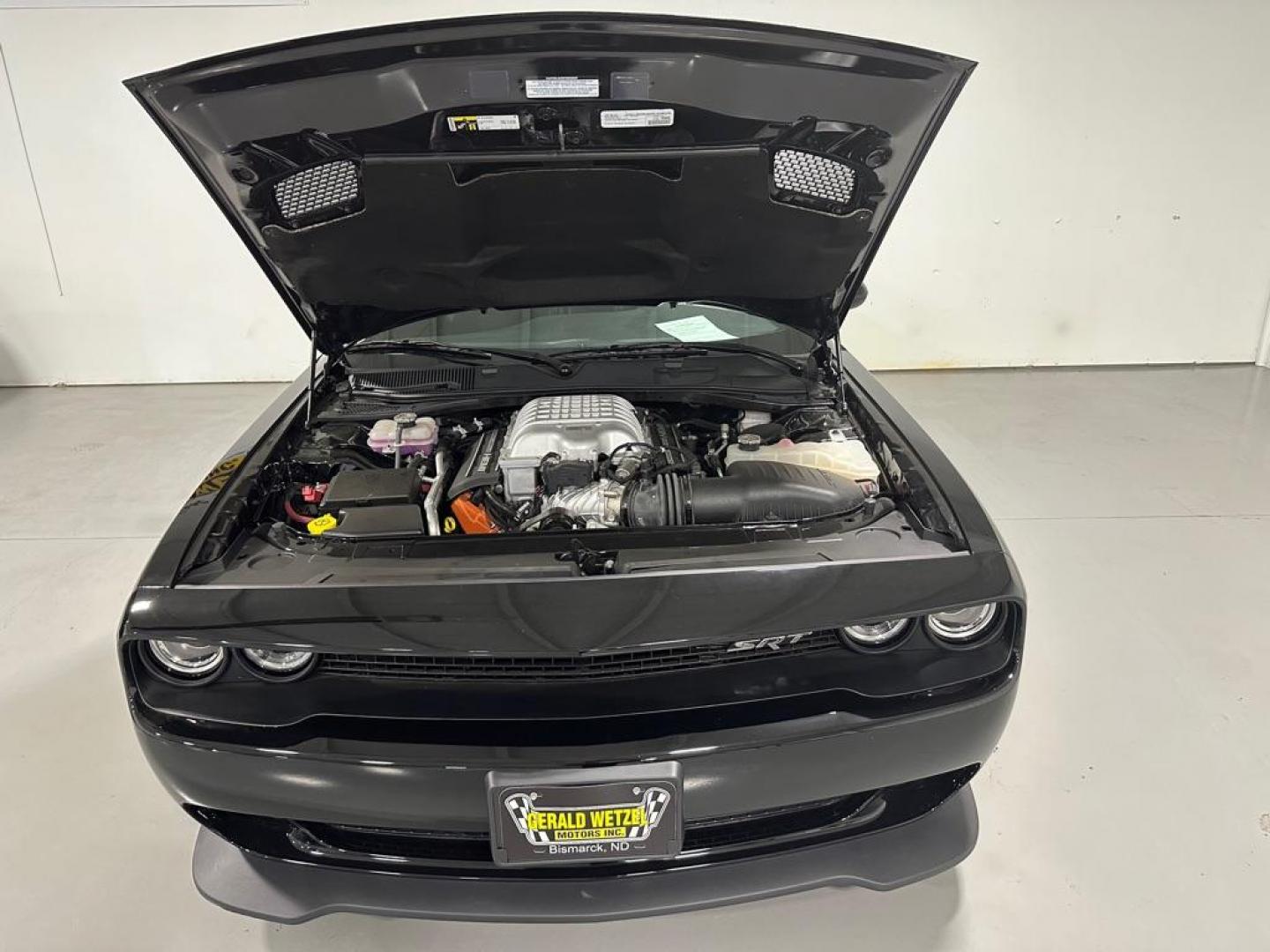 2015 BLACK DODGE CHALLENGER SRT HELLCAT (2C3CDZC94FH) with an 6.2L engine, 6-Speed Manual transmission, located at 1030 S. 22nd St., Bismarck, ND, 58504, (701) 258-0022, 46.793560, -100.758118 - ACTUAL MILES 1375. SRT 8 HELLCAT SUPER CHARGED, AUTO 704 HP. LIKE NEW. GREAT INVESTMENT. - Photo#9