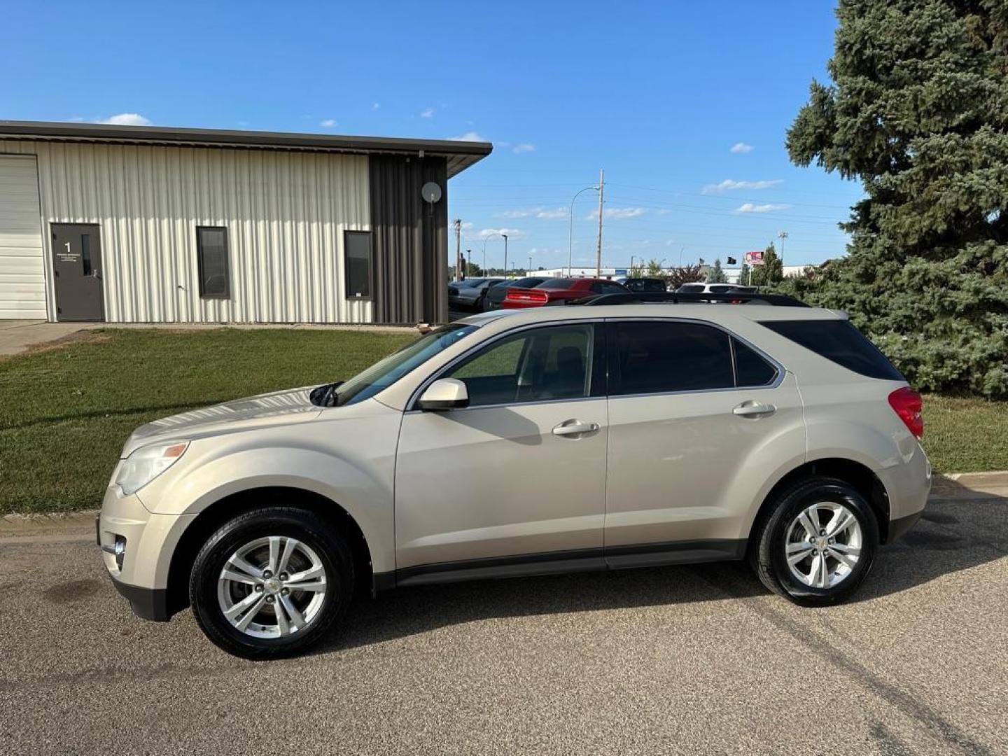 2011 GOLD CHEVROLET EQUINOX LT (2GNALPEC6B1) with an 2.4L engine, Automatic transmission, located at 1030 S. 22nd St., Bismarck, ND, 58504, (701) 258-0022, 46.793560, -100.758118 - Photo#0