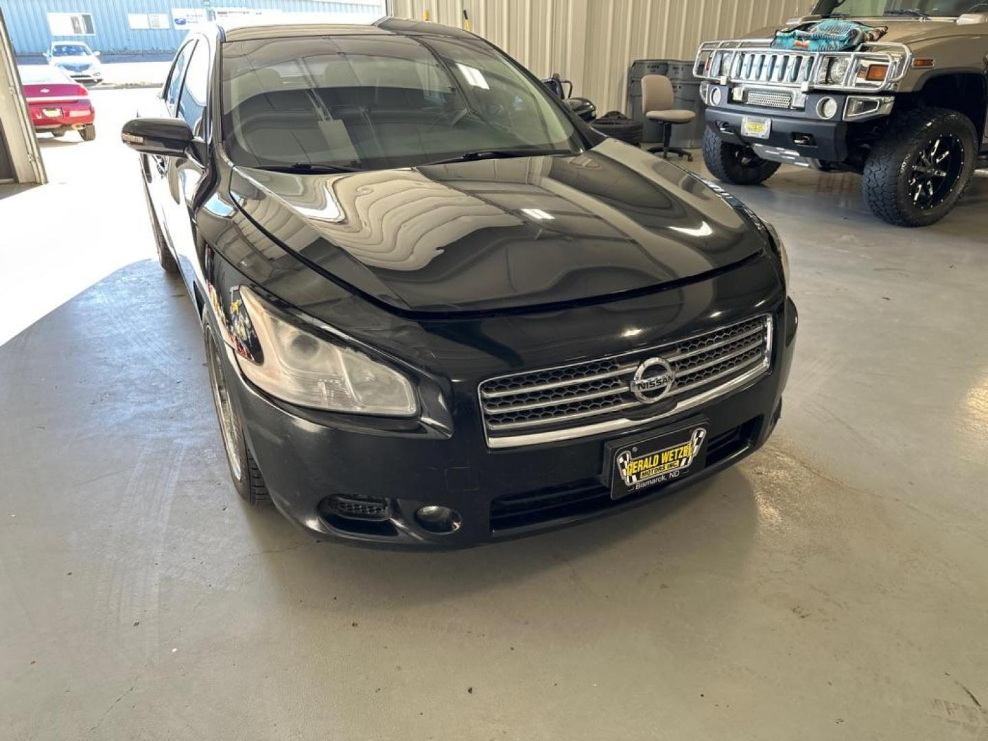 2009 BLACK NISSAN MAXIMA S (1N4AA51E09C) with an 3.5L engine, Continuously Variable transmission, located at 1030 S. 22nd St., Bismarck, ND, 58504, (701) 258-0022, 46.793560, -100.758118 - Photo#1