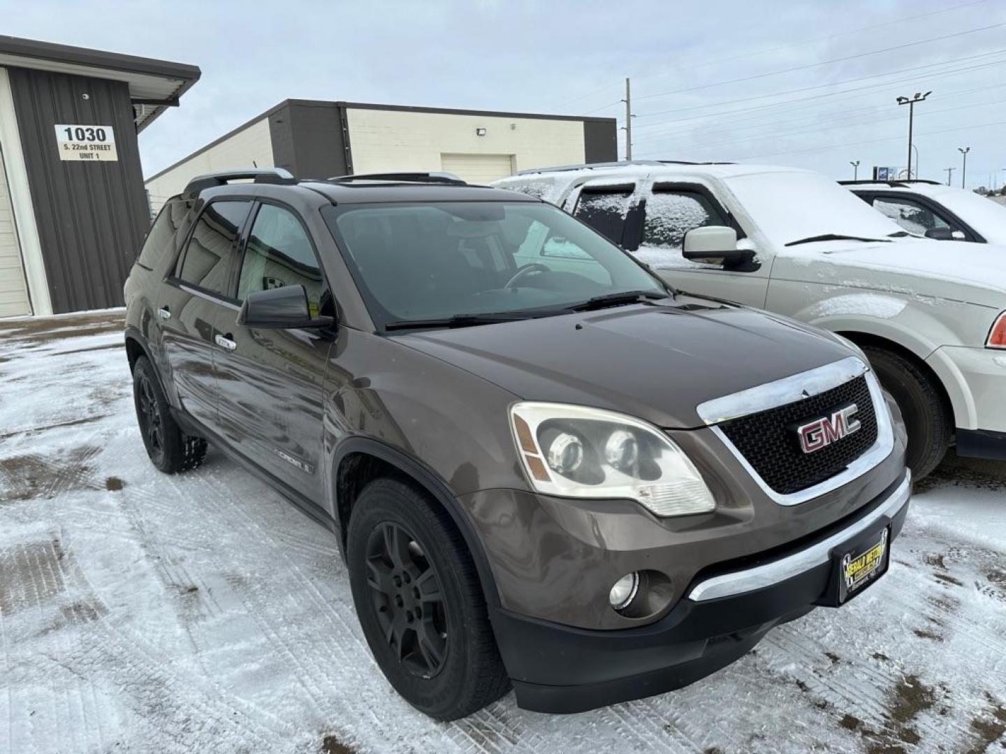 2007 BROWN GMC ACADIA SLE (1GKEV13787J) with an 3.6L engine, Automatic transmission, located at 1030 S. 22nd St., Bismarck, ND, 58504, (701) 258-0022, 46.793560, -100.758118 - light left quarter damage - Photo#1