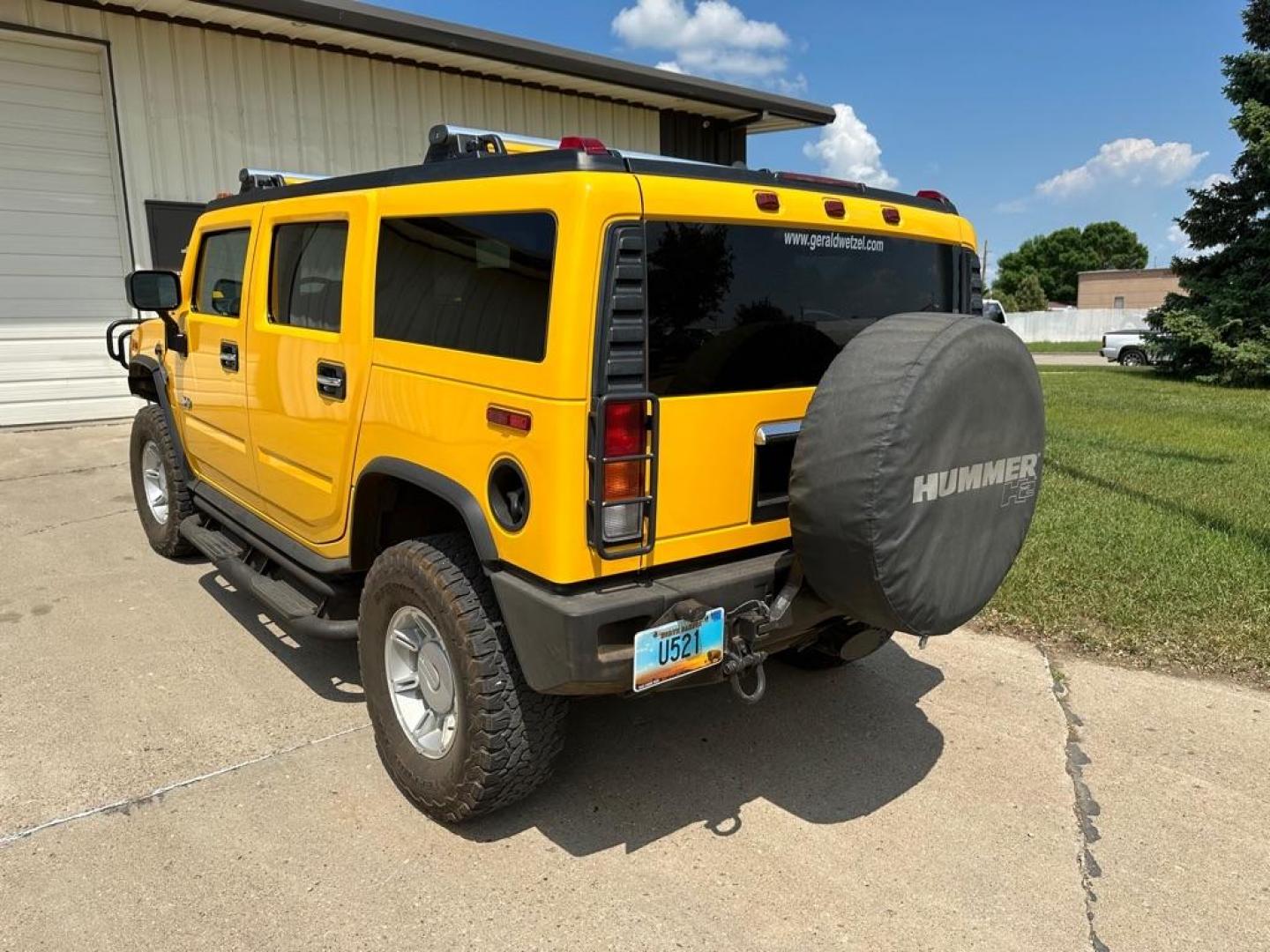 2003 YELLOW HUMMER H2 BASE (5GRGN23U03H) with an 6.0L engine, Automatic transmission, located at 1030 S. 22nd St., Bismarck, ND, 58504, (701) 258-0022, 46.793560, -100.758118 - Excellent Conddition - Photo#1