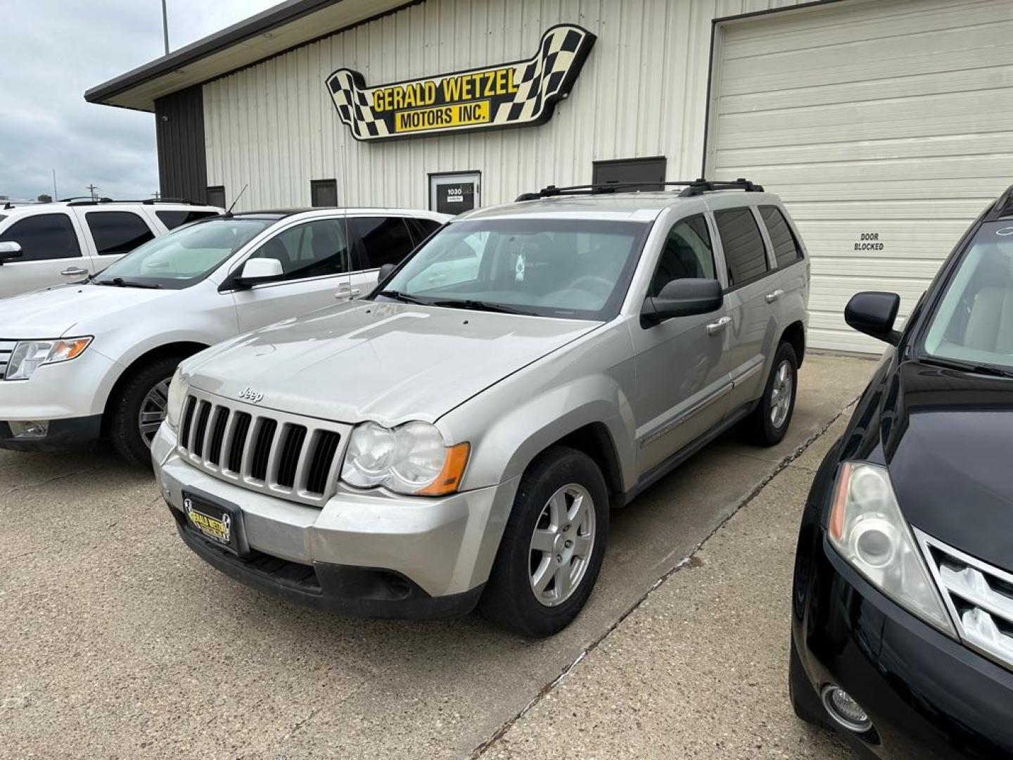 2010 GREY JEEP GRAND CHEROKEE LAREDO (1J4PR4GK8AC) with an 3.7L engine, Automatic transmission, located at 1030 S. 22nd St., Bismarck, ND, 58504, (701) 258-0022, 46.793560, -100.758118 - Photo#0