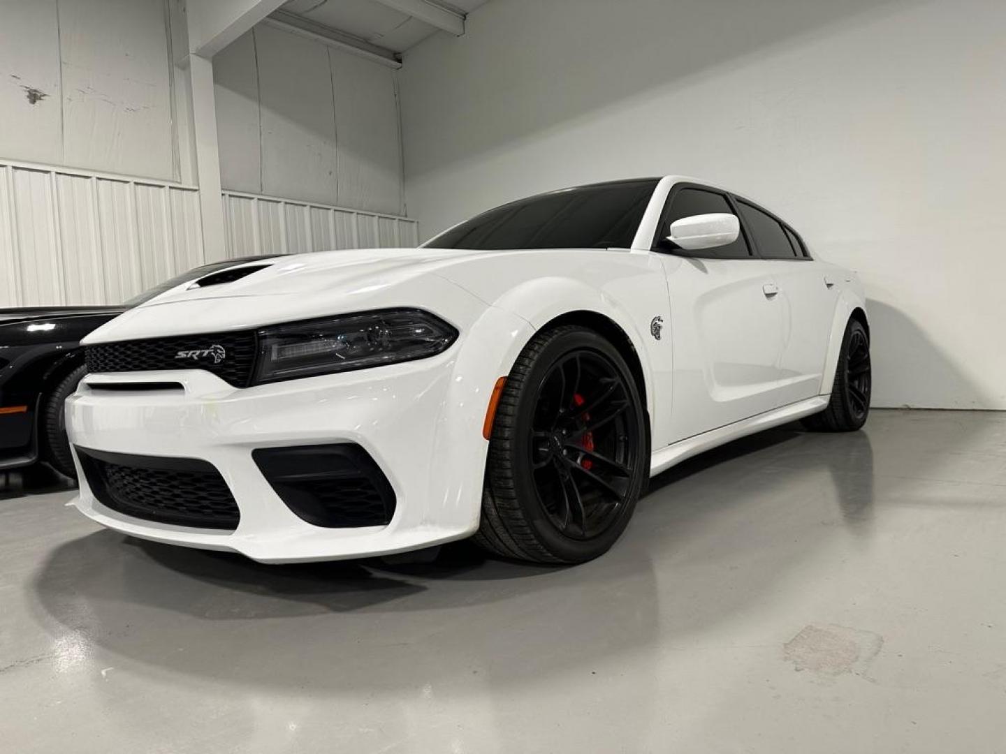 2021 WHITE DODGE CHARGER HELLCAT SRT HELLCAT (2C3CDXL91MH) with an 6.2L engine, Automatic transmission, located at 1030 S. 22nd St., Bismarck, ND, 58504, (701) 258-0022, 46.793560, -100.758118 - WIDE BODY HELLCAT. RED INTERIOR - Photo#0