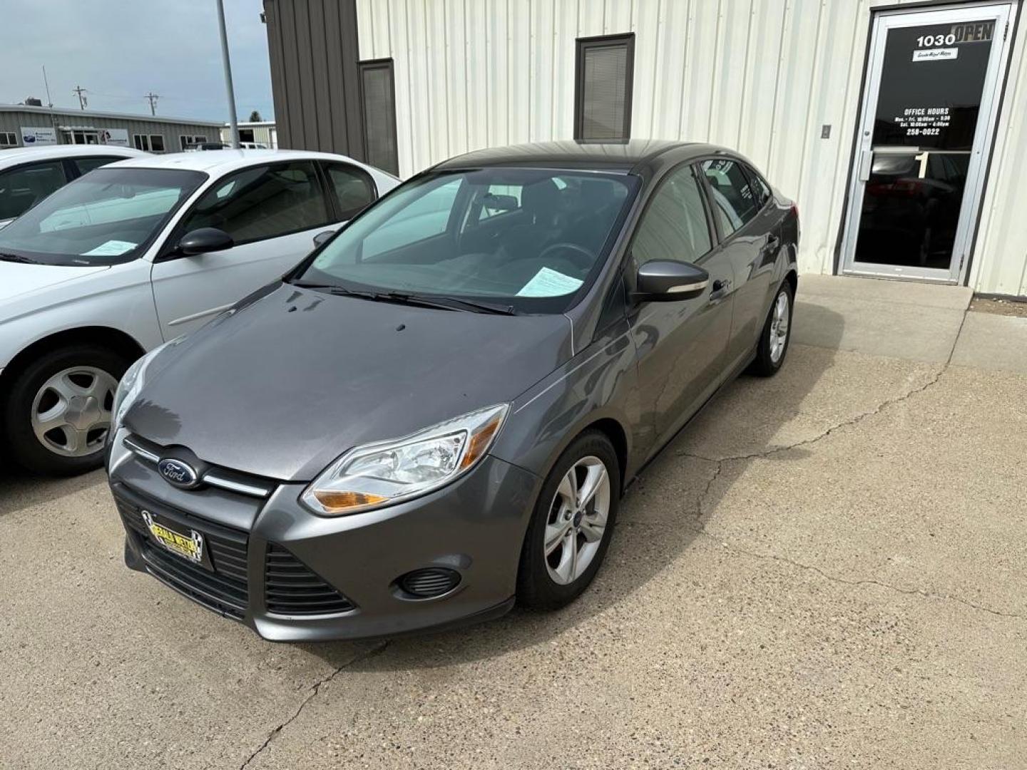 2014 BLUE FORD FOCUS SE (1FADP3F25EL) with an 2.0L engine, Automatic transmission, located at 1030 S. 22nd St., Bismarck, ND, 58504, (701) 258-0022, 46.793560, -100.758118 - Photo#0