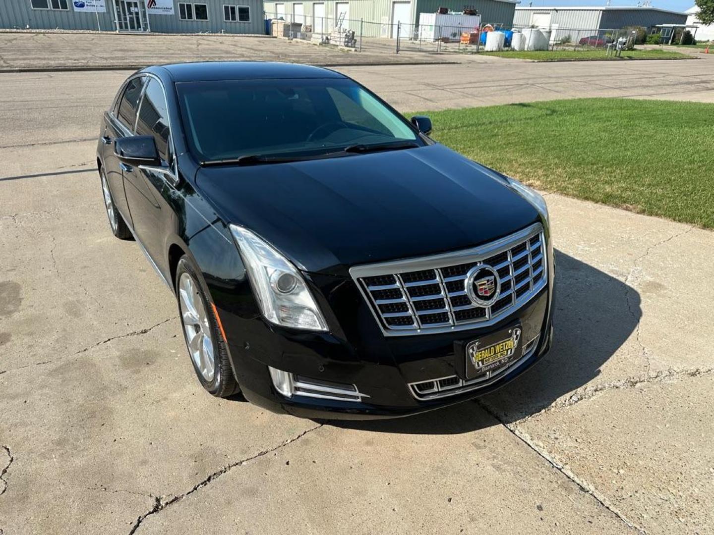 2014 BLACK CADILLAC XTS LUXURY COLLECTION (2G61M5S39E9) with an 3.6L engine, Automatic transmission, located at 1030 S. 22nd St., Bismarck, ND, 58504, (701) 258-0022, 46.793560, -100.758118 - FWD , REBUILT TRANMISSION, NEW STRUTS FRONT AND REAR. NICE CAR - Photo#2