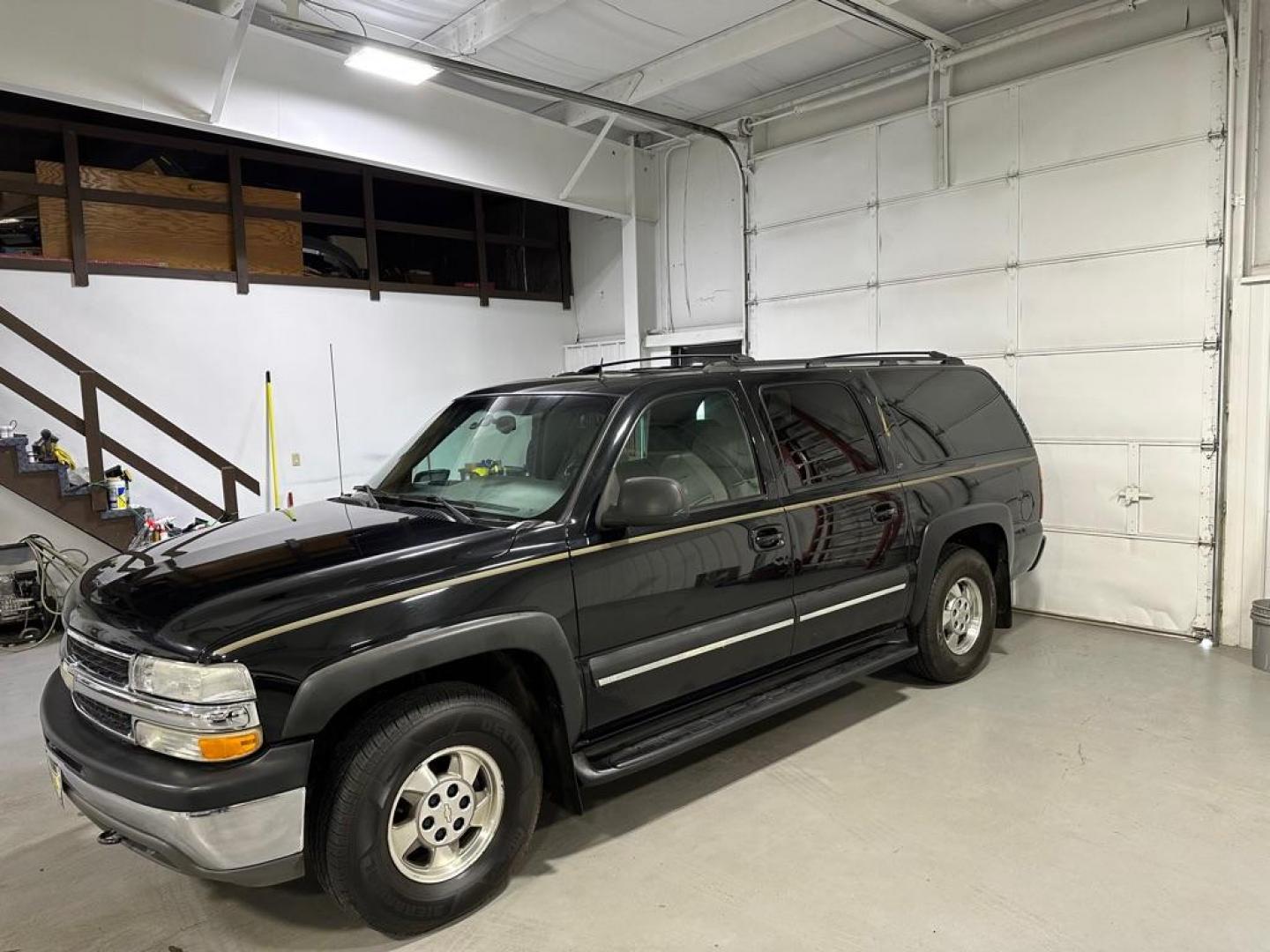 2002 BLACK CHEVROLET SUBURBAN 1500 (3GNFK16Z62G) with an 5.3L engine, Automatic transmission, located at 1030 S. 22nd St., Bismarck, ND, 58504, (701) 258-0022, 46.793560, -100.758118 - Photo#0