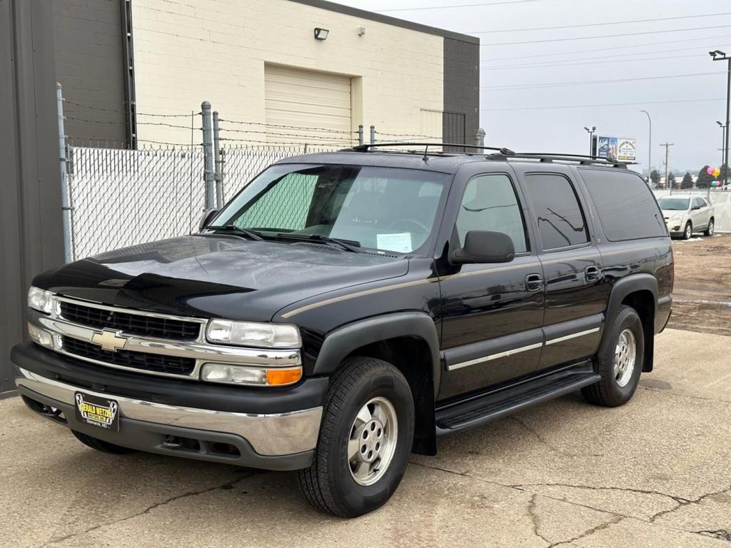 2002 BLACK CHEVROLET SUBURBAN 1500 (3GNFK16Z62G) with an 5.3L engine, Automatic transmission, located at 1030 S. 22nd St., Bismarck, ND, 58504, (701) 258-0022, 46.793560, -100.758118 - Photo#2