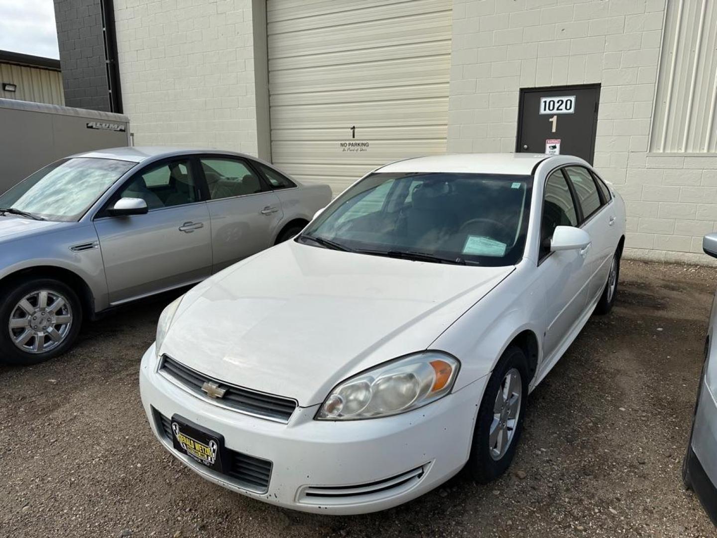 2009 WHITE CHEVROLET IMPALA 1LT (2G1WT57K691) with an 3.5L engine, Automatic transmission, located at 1030 S. 22nd St., Bismarck, ND, 58504, (701) 258-0022, 46.793560, -100.758118 - Photo#0