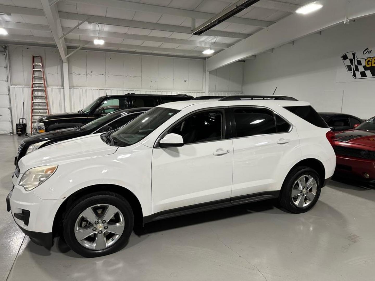 2013 WHITE CHEVROLET EQUINOX LT (2GNFLEEK8D6) with an 2.4L engine, Automatic transmission, located at 1030 S. 22nd St., Bismarck, ND, 58504, (701) 258-0022, 46.793560, -100.758118 - REBUILT 4 CYL ENGINE. - Photo#0