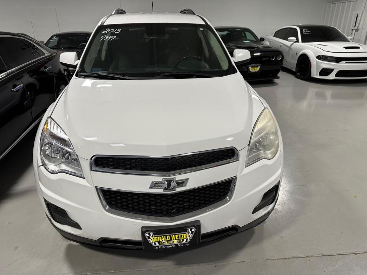 2013 WHITE CHEVROLET EQUINOX LT (2GNFLEEK8D6) with an 2.4L engine, Automatic transmission, located at 1030 S. 22nd St., Bismarck, ND, 58504, (701) 258-0022, 46.793560, -100.758118 - REBUILT 4 CYL ENGINE. - Photo#1