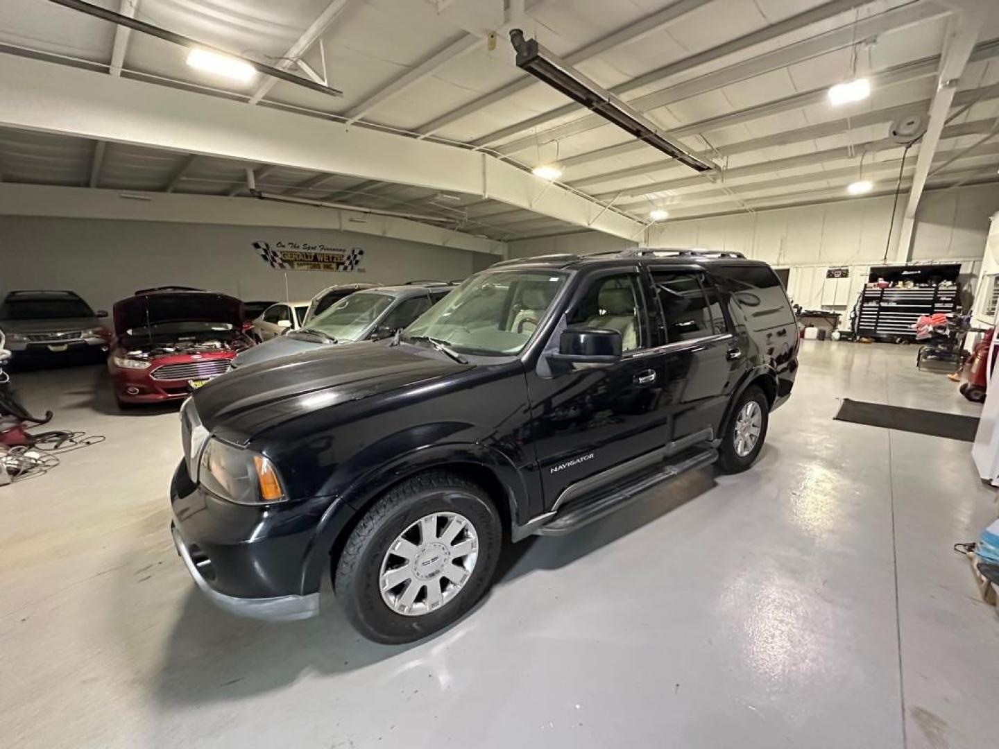 2004 BLACK LINCOLN NAVIGATOR (5LMFU28R54L) with an 5.4L engine, Automatic transmission, located at 1030 S. 22nd St., Bismarck, ND, 58504, (701) 258-0022, 46.793560, -100.758118 - Photo#0