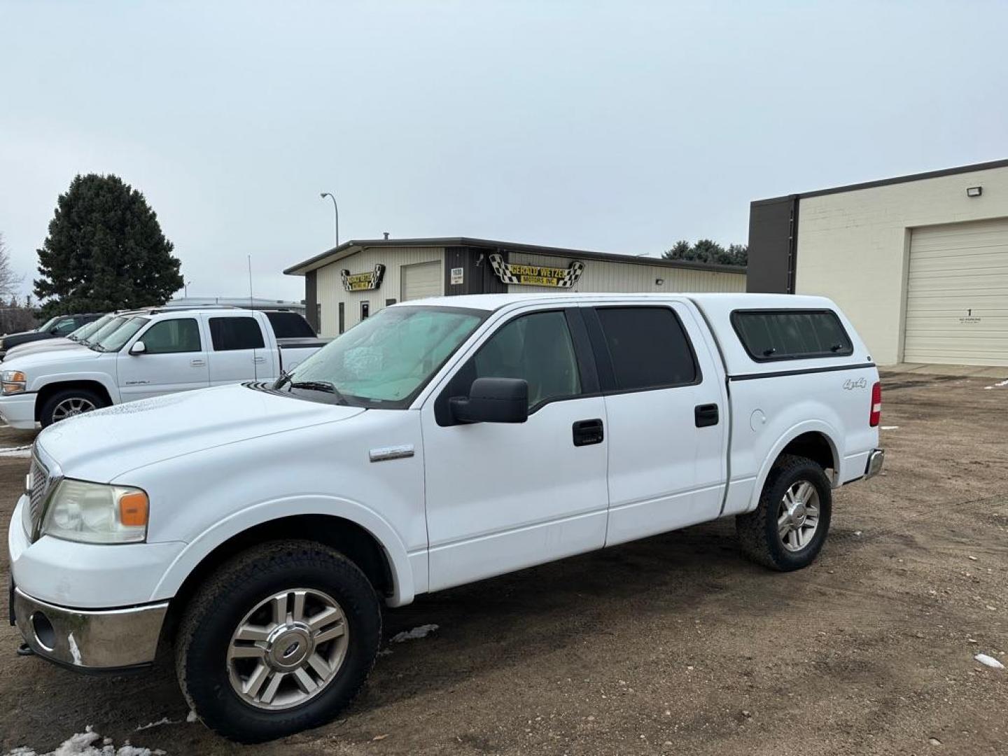 2006 WHITE FORD F150 SUPERCREW (1FTPW14526F) with an 5.4L engine, Automatic transmission, located at 1030 S. 22nd St., Bismarck, ND, 58504, (701) 258-0022, 46.793560, -100.758118 - 5.4 LITER-4X4 TOPPER - Photo#0