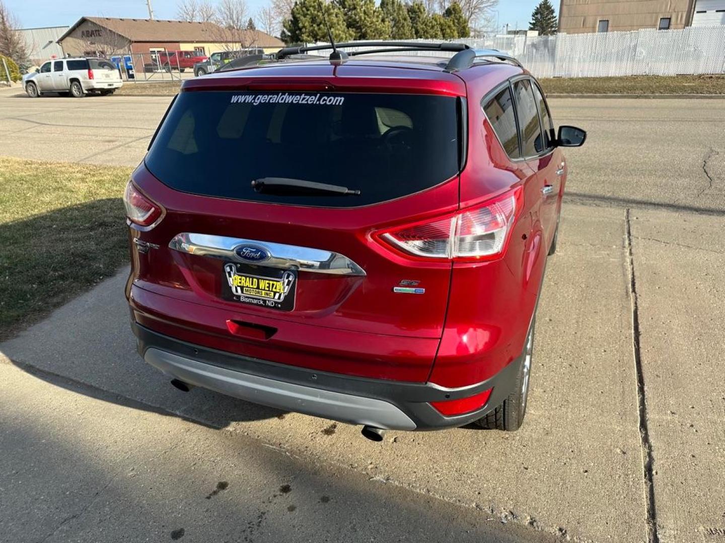 2014 RED FORD ESCAPE SE (1FMCU9G92EU) with an 2.0L engine, Automatic transmission, located at 1030 S. 22nd St., Bismarck, ND, 58504, (701) 258-0022, 46.793560, -100.758118 - Photo#9