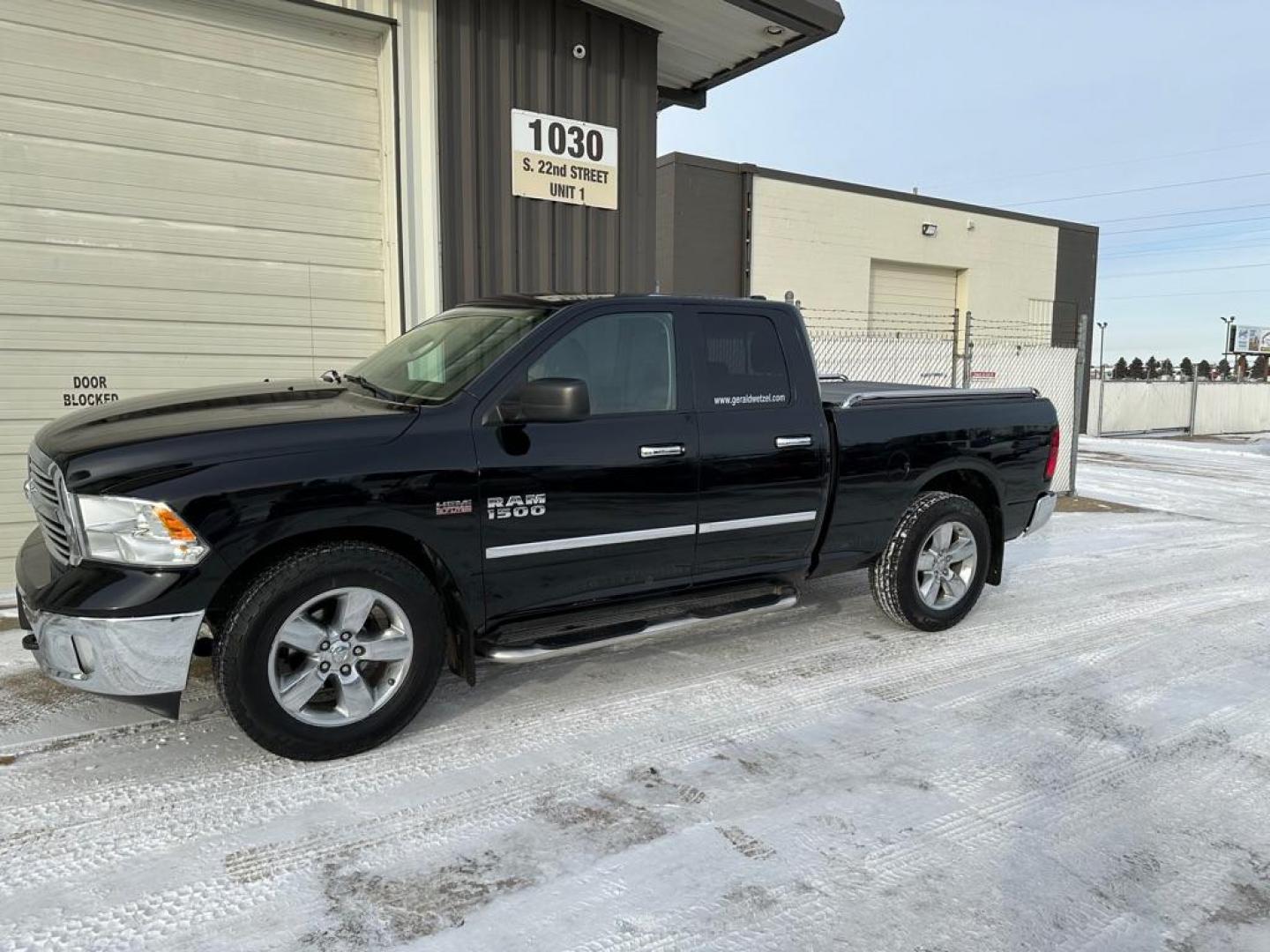 2014 BLACK RAM 1500 SLT (1C6RR7GT4ES) with an 5.7L engine, Automatic transmission, located at 1030 S. 22nd St., Bismarck, ND, 58504, (701) 258-0022, 46.793560, -100.758118 - 5.7 LITER HEMI 4X4 GAS 4DOOR - Photo#0