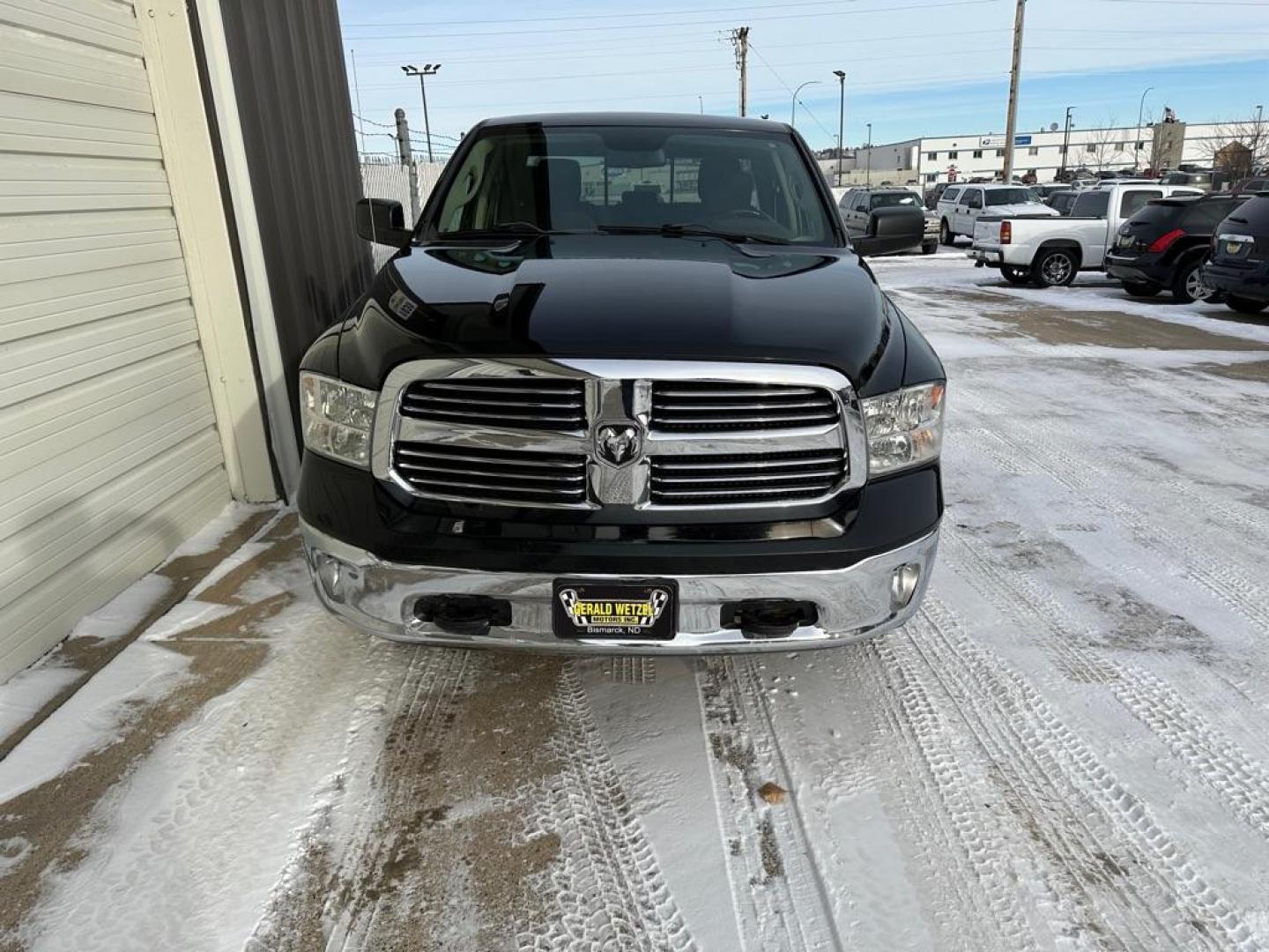 2014 BLACK RAM 1500 SLT (1C6RR7GT4ES) with an 5.7L engine, Automatic transmission, located at 1030 S. 22nd St., Bismarck, ND, 58504, (701) 258-0022, 46.793560, -100.758118 - 5.7 LITER HEMI 4X4 GAS 4DOOR - Photo#1