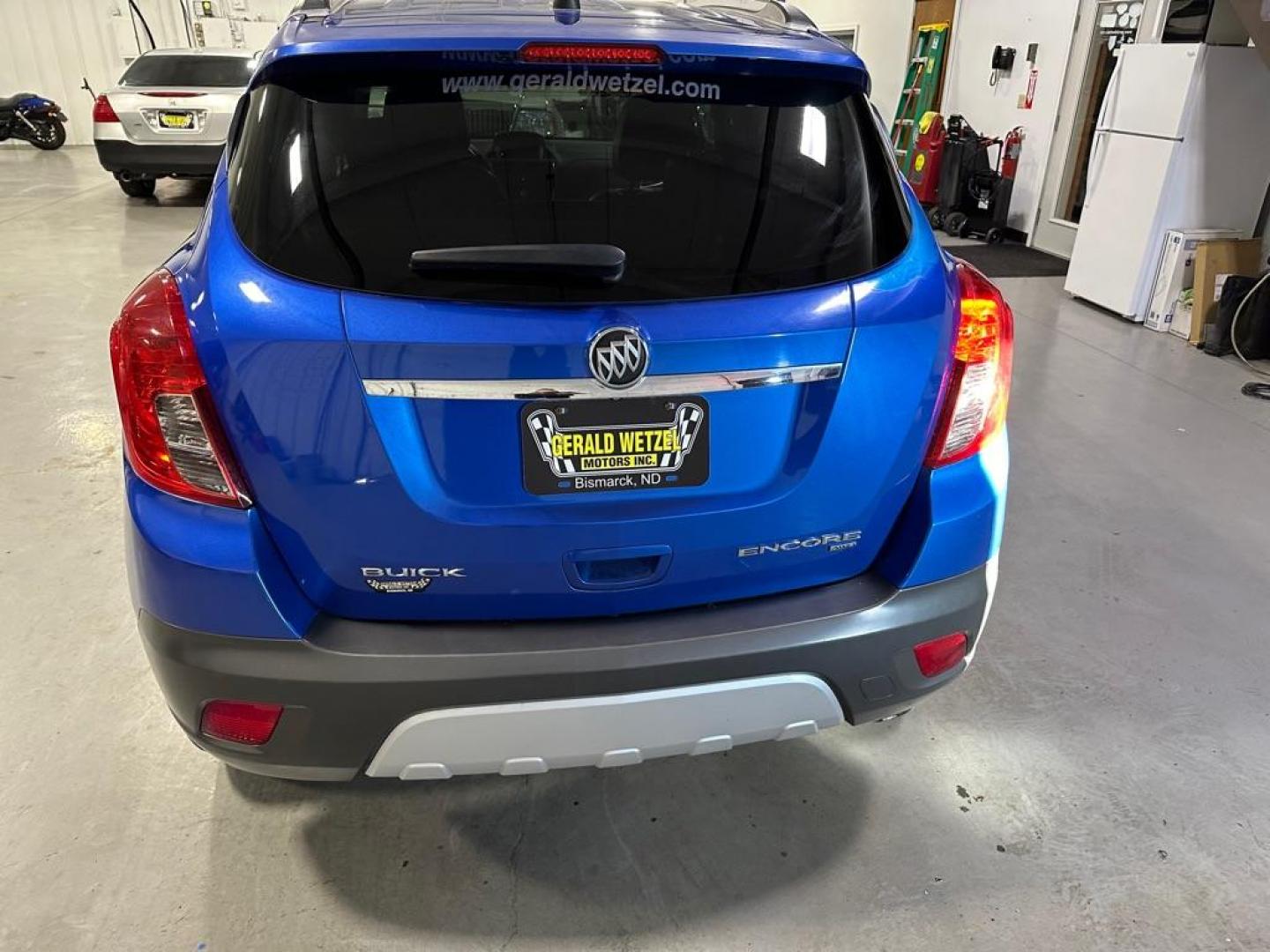 2014 BLUE BUICK ENCORE (KL4CJGSB6EB) with an 1.4L engine, Automatic transmission, located at 1030 S. 22nd St., Bismarck, ND, 58504, (701) 258-0022, 46.793560, -100.758118 - Photo#2