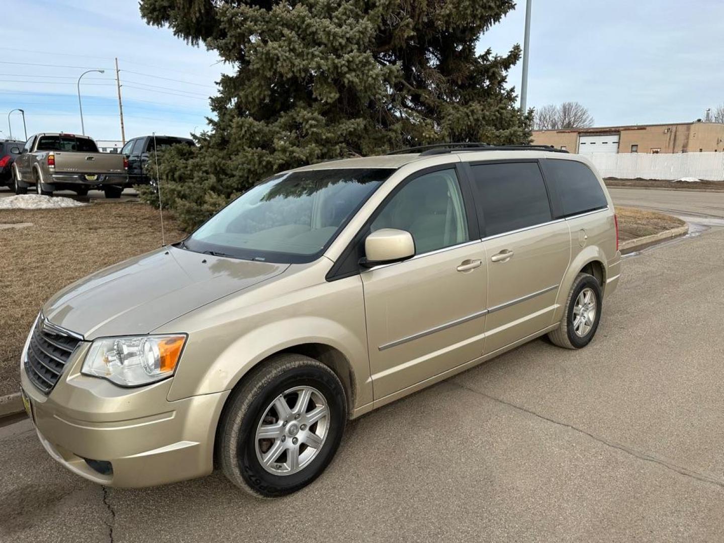 2010 GOLD CHRYSLER TOWN and COUNTRY TOURING (2A4RR5DX2AR) with an 4.0L engine, Automatic transmission, located at 1030 S. 22nd St., Bismarck, ND, 58504, (701) 258-0022, 46.793560, -100.758118 - PRIOR DAMGE STAMPED ON TITLE - Photo#0