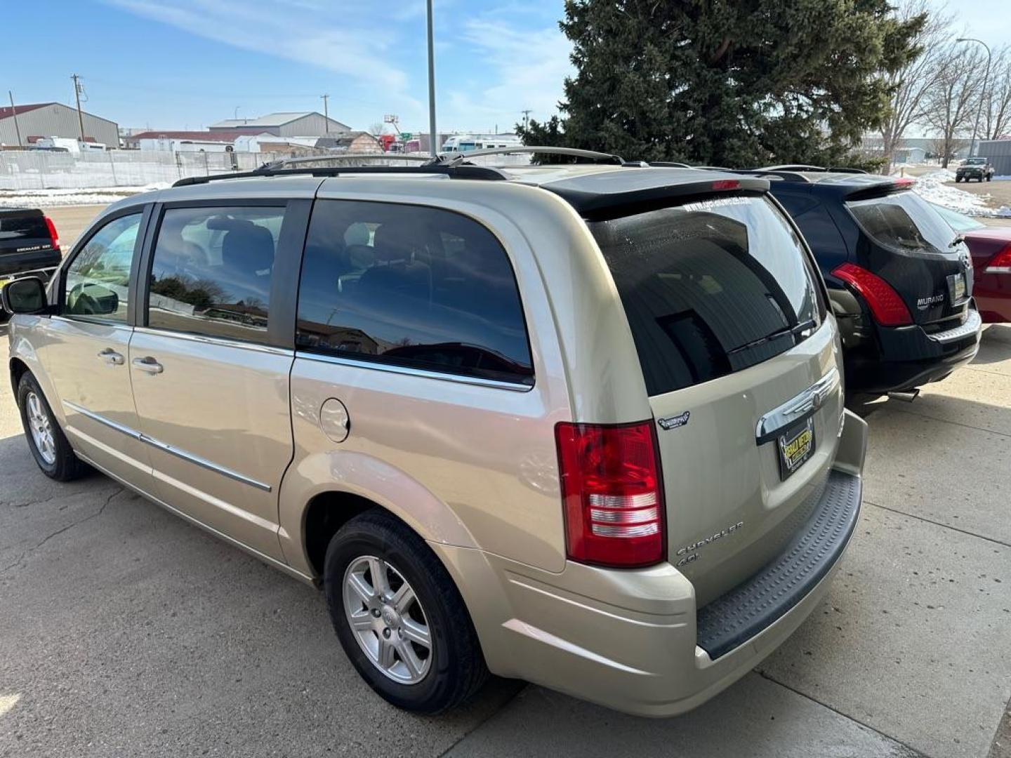 2010 GOLD CHRYSLER TOWN and COUNTRY TOURING (2A4RR5DX2AR) with an 4.0L engine, Automatic transmission, located at 1030 S. 22nd St., Bismarck, ND, 58504, (701) 258-0022, 46.793560, -100.758118 - PRIOR DAMGE STAMPED ON TITLE - Photo#2