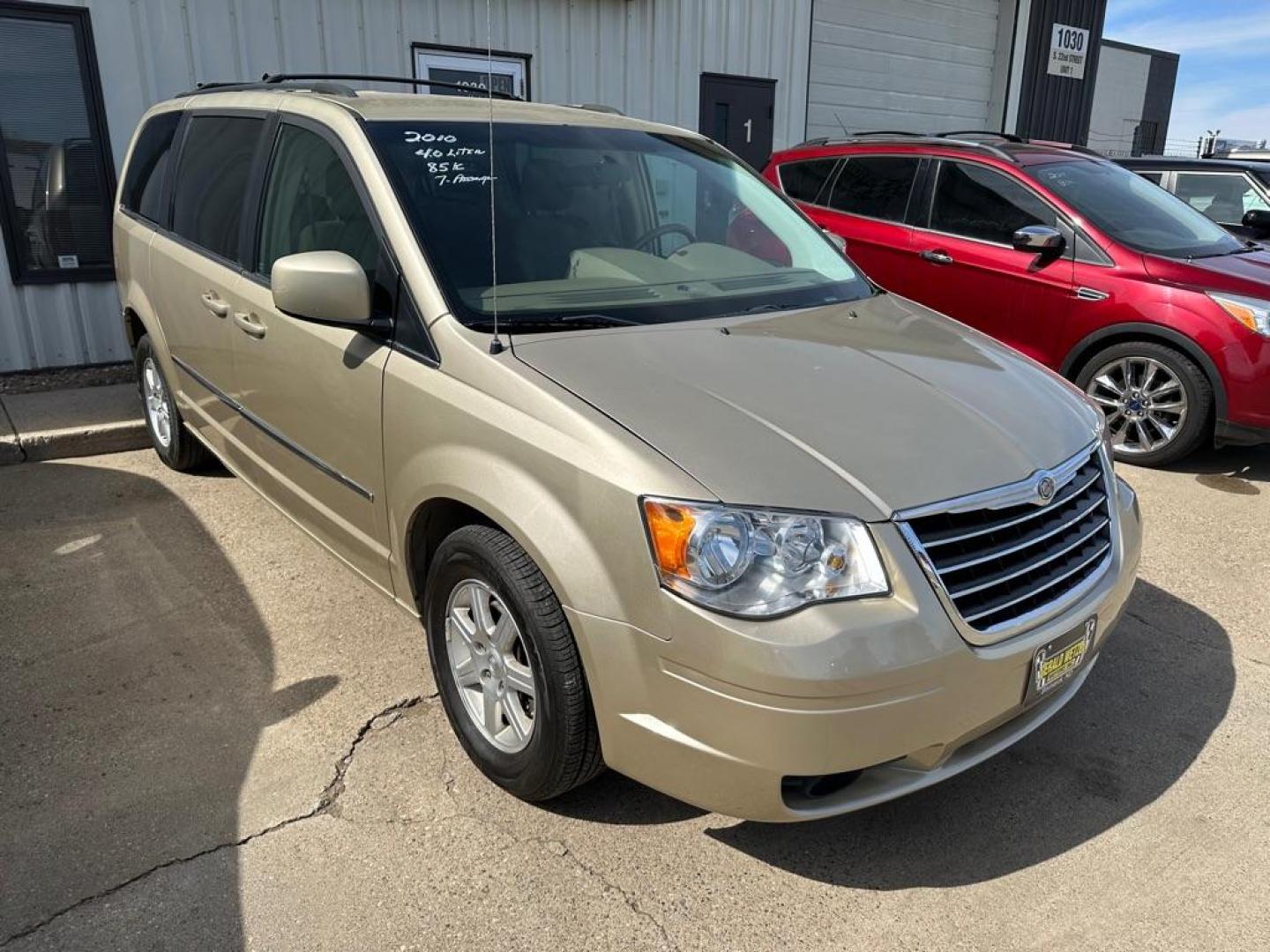 2010 GOLD CHRYSLER TOWN and COUNTRY TOURING (2A4RR5DX2AR) with an 4.0L engine, Automatic transmission, located at 1030 S. 22nd St., Bismarck, ND, 58504, (701) 258-0022, 46.793560, -100.758118 - PRIOR DAMGE STAMPED ON TITLE - Photo#3