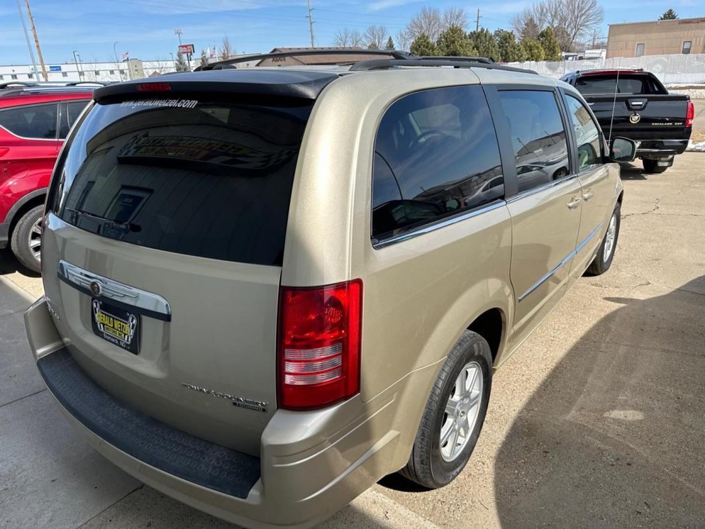 2010 GOLD CHRYSLER TOWN and COUNTRY TOURING (2A4RR5DX2AR) with an 4.0L engine, Automatic transmission, located at 1030 S. 22nd St., Bismarck, ND, 58504, (701) 258-0022, 46.793560, -100.758118 - PRIOR DAMGE STAMPED ON TITLE - Photo#4