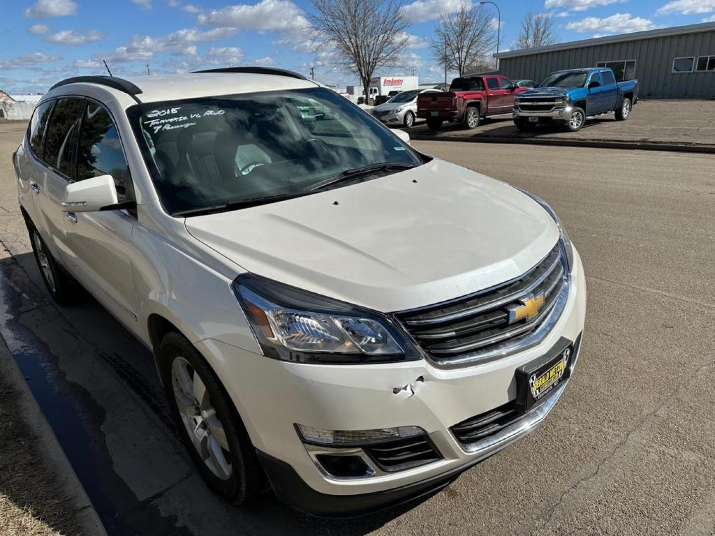 2015 WHITE CHEVROLET TRAVERSE LTZ (1GNKVJKD4FJ) with an 3.6L engine, Automatic transmission, located at 1030 S. 22nd St., Bismarck, ND, 58504, (701) 258-0022, 46.793560, -100.758118 - Photo#2