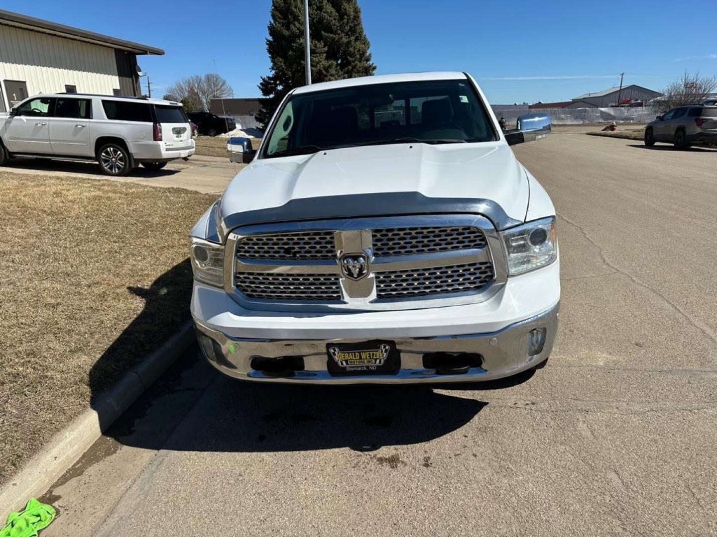 2015 WHITE RAM 1500 LARAMIE (1C6RR7NT3FS) with an 5.7L engine, Automatic transmission, located at 1030 S. 22nd St., Bismarck, ND, 58504, (701) 258-0022, 46.793560, -100.758118 - Photo#1