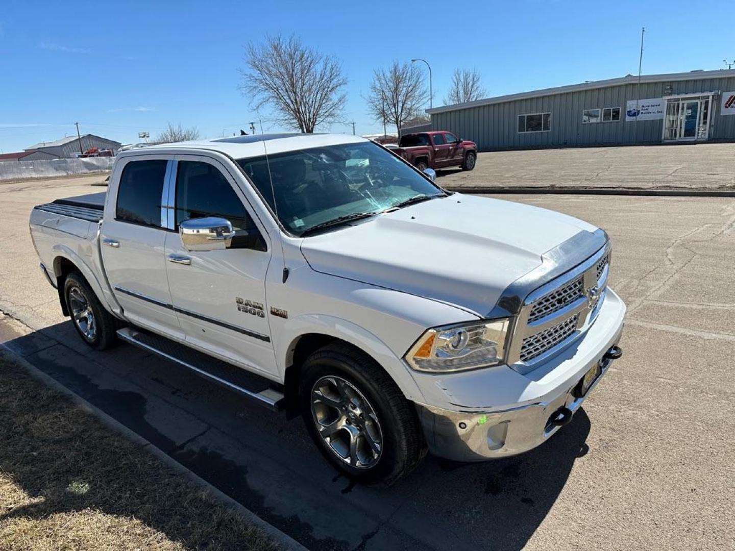 2015 WHITE RAM 1500 LARAMIE (1C6RR7NT3FS) with an 5.7L engine, Automatic transmission, located at 1030 S. 22nd St., Bismarck, ND, 58504, (701) 258-0022, 46.793560, -100.758118 - Photo#2