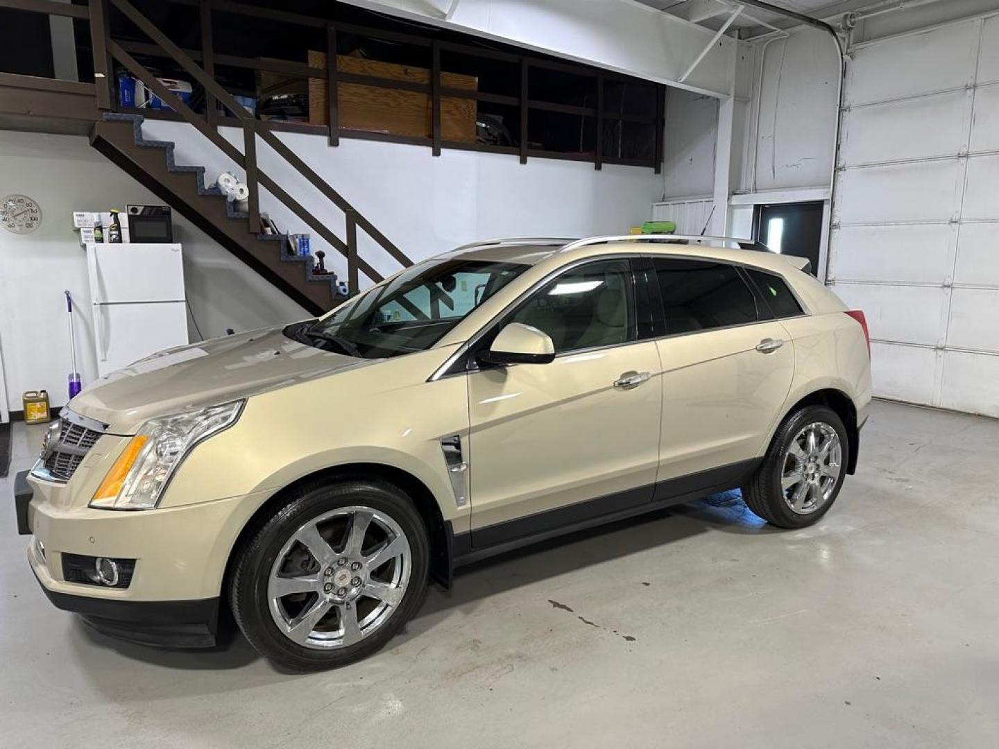 2012 TAN CADILLAC SRX PREMIUM COLLECTION (3GYFNFE36CS) with an 3.6L engine, Automatic transmission, located at 1030 S. 22nd St., Bismarck, ND, 58504, (701) 258-0022, 46.793560, -100.758118 - Photo#0