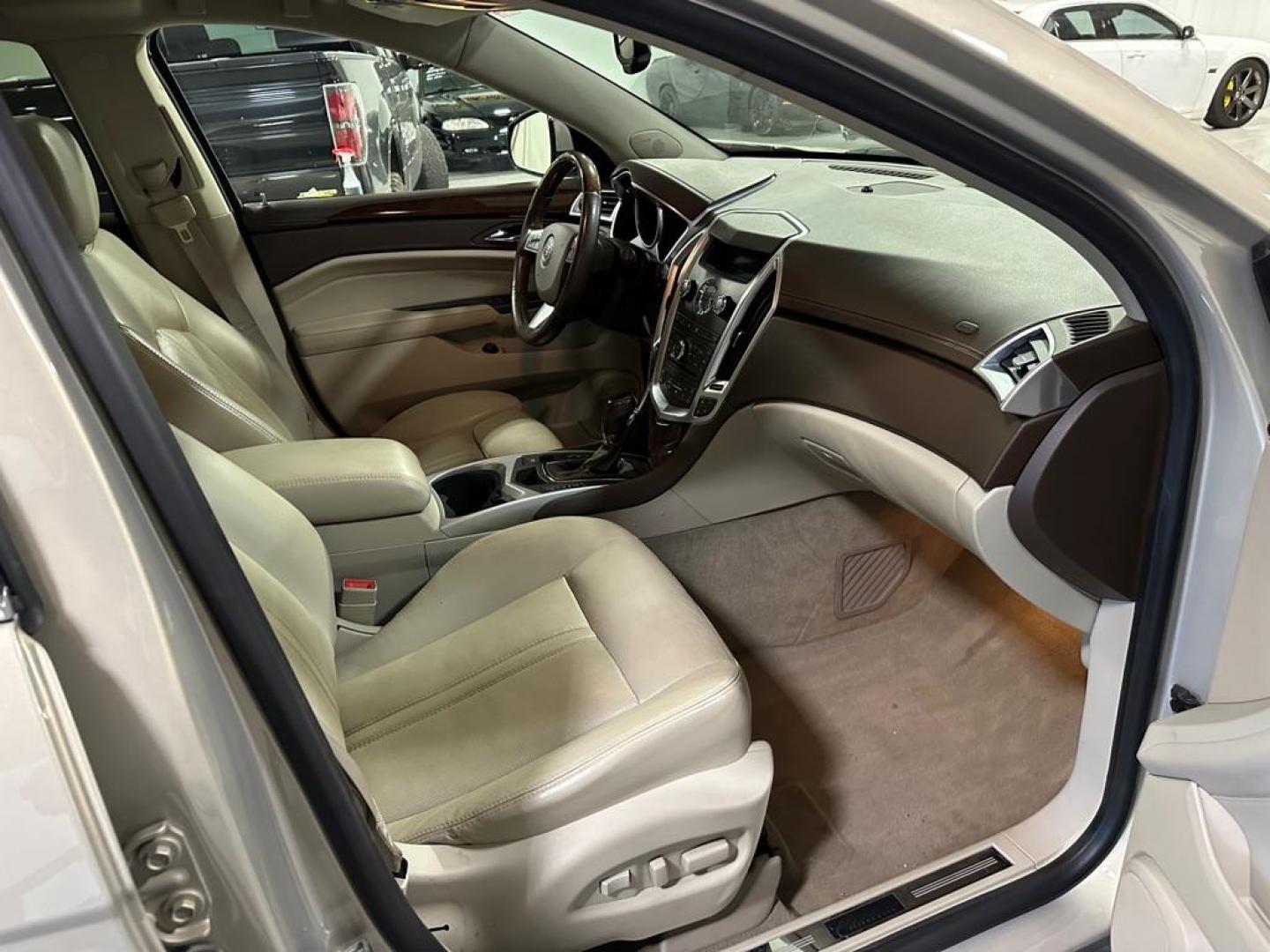 2012 TAN CADILLAC SRX PREMIUM COLLECTION (3GYFNFE36CS) with an 3.6L engine, Automatic transmission, located at 1030 S. 22nd St., Bismarck, ND, 58504, (701) 258-0022, 46.793560, -100.758118 - Photo#4