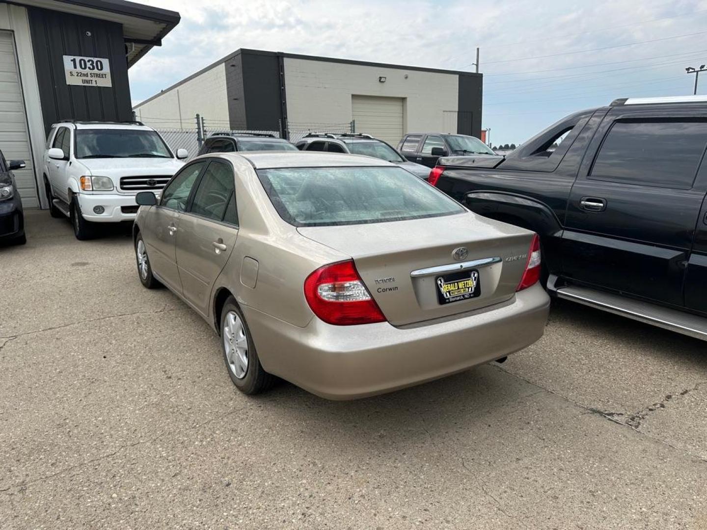 2002 BROWN TOYOTA CAMRY LE (4T1BE32K62U) with an 2.4L engine, Automatic transmission, located at 1030 S. 22nd St., Bismarck, ND, 58504, (701) 258-0022, 46.793560, -100.758118 - AC BLOWS COLD - Photo#2