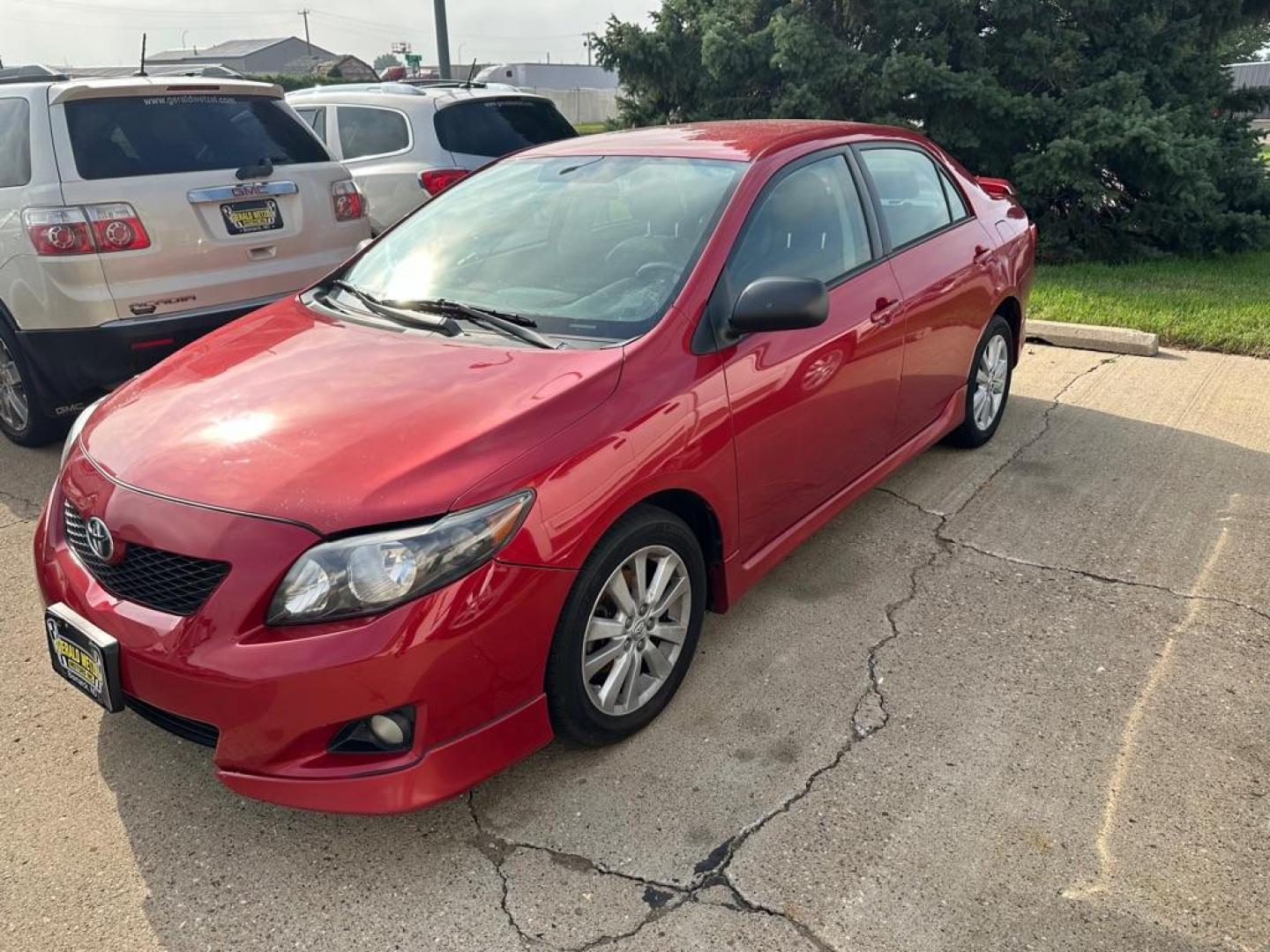 2009 RED TOYOTA COROLLA BASE (1NXBU40E09Z) with an 1.8L engine, Automatic transmission, located at 1030 S. 22nd St., Bismarck, ND, 58504, (701) 258-0022, 46.793560, -100.758118 - Photo#0