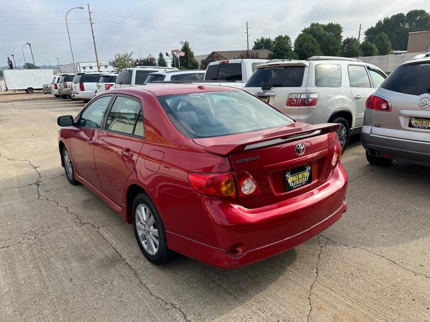 2009 RED TOYOTA COROLLA BASE (1NXBU40E09Z) with an 1.8L engine, Automatic transmission, located at 1030 S. 22nd St., Bismarck, ND, 58504, (701) 258-0022, 46.793560, -100.758118 - Photo#1