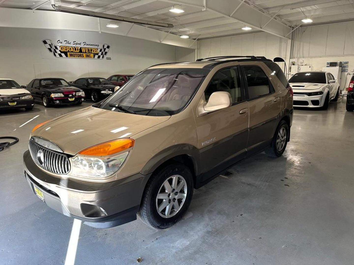 2002 BROWN BUICK RENDEZVOUS CX (3G5DB03EX2S) with an 3.4L engine, Automatic transmission, located at 1030 S. 22nd St., Bismarck, ND, 58504, (701) 258-0022, 46.793560, -100.758118 - Photo#0