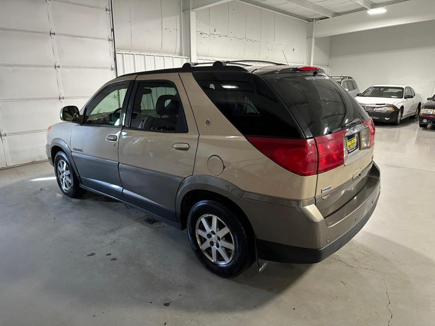 2002 BROWN BUICK RENDEZVOUS CX (3G5DB03EX2S) with an 3.4L engine, Automatic transmission, located at 1030 S. 22nd St., Bismarck, ND, 58504, (701) 258-0022, 46.793560, -100.758118 - Photo#1