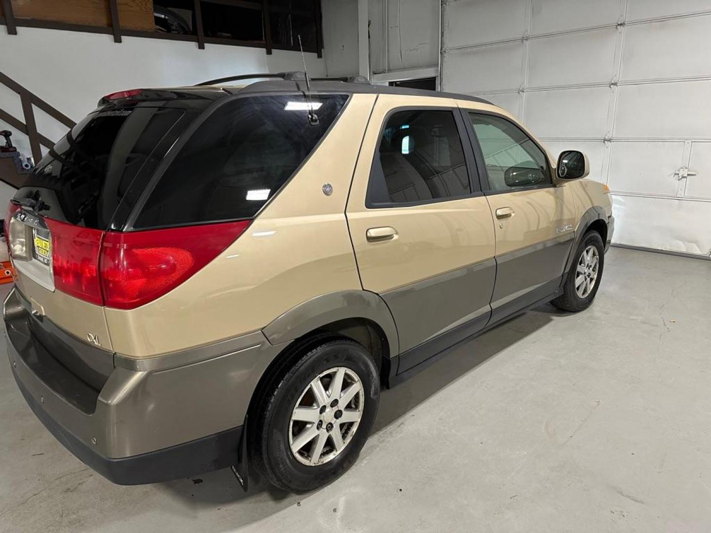 2002 BROWN BUICK RENDEZVOUS CX (3G5DB03EX2S) with an 3.4L engine, Automatic transmission, located at 1030 S. 22nd St., Bismarck, ND, 58504, (701) 258-0022, 46.793560, -100.758118 - Photo#4