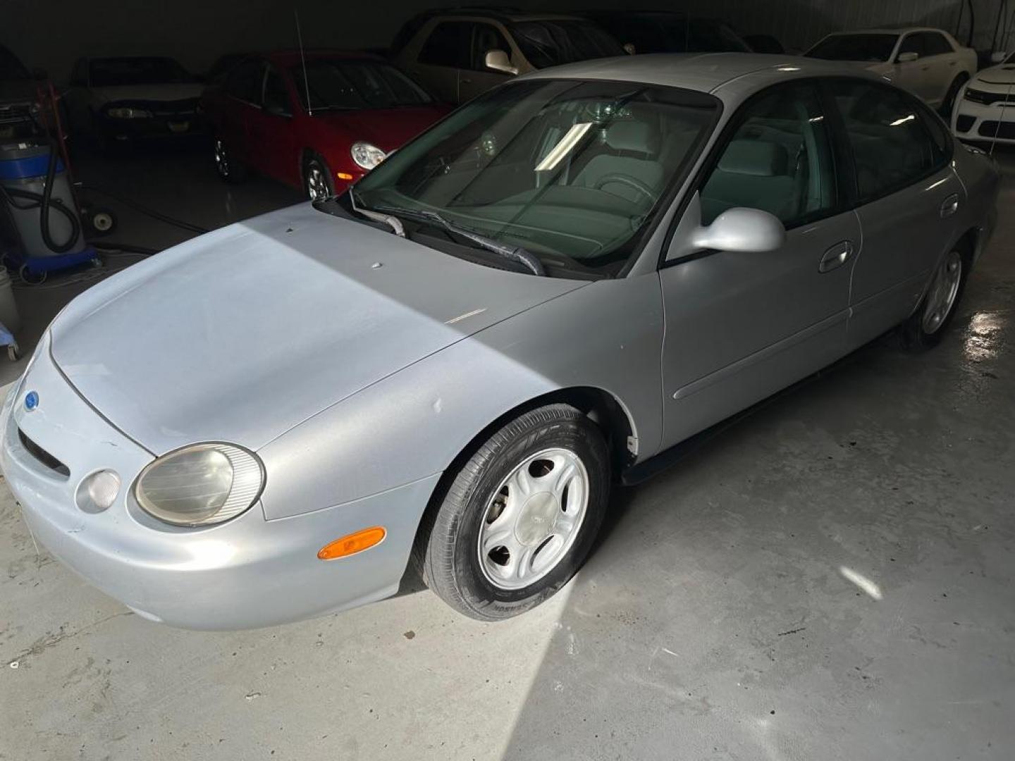 1996 SILVER FORD TAURUS GL (1FALP52U3TG) with an 3.0L engine, Automatic transmission, located at 1030 S. 22nd St., Bismarck, ND, 58504, (701) 258-0022, 46.793560, -100.758118 - Photo#0