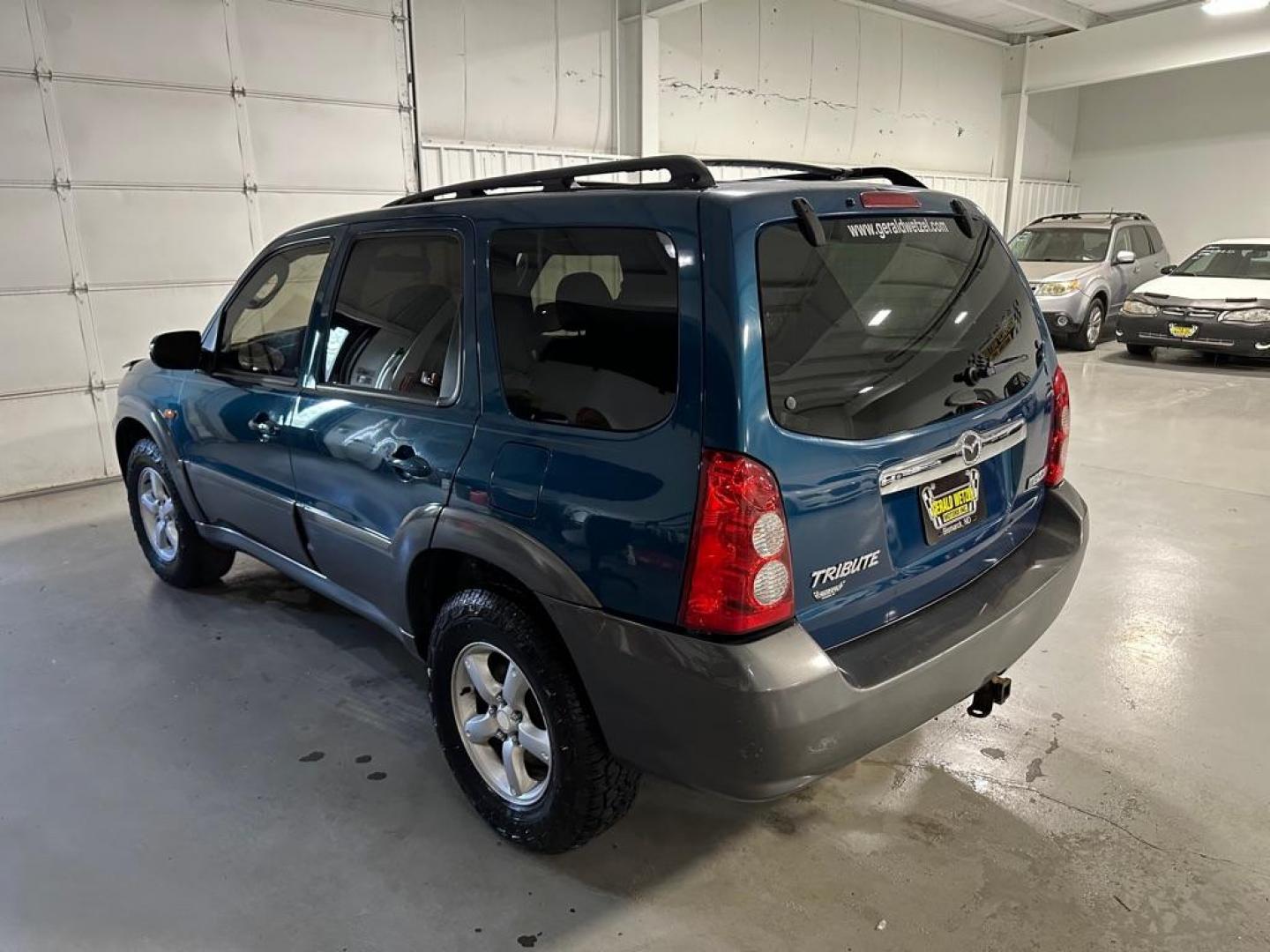 2005 BLUE MAZDA TRIBUTE S (4F2YZ04125K) with an 3.0L engine, Automatic transmission, located at 1030 S. 22nd St., Bismarck, ND, 58504, (701) 258-0022, 46.793560, -100.758118 - Photo#1