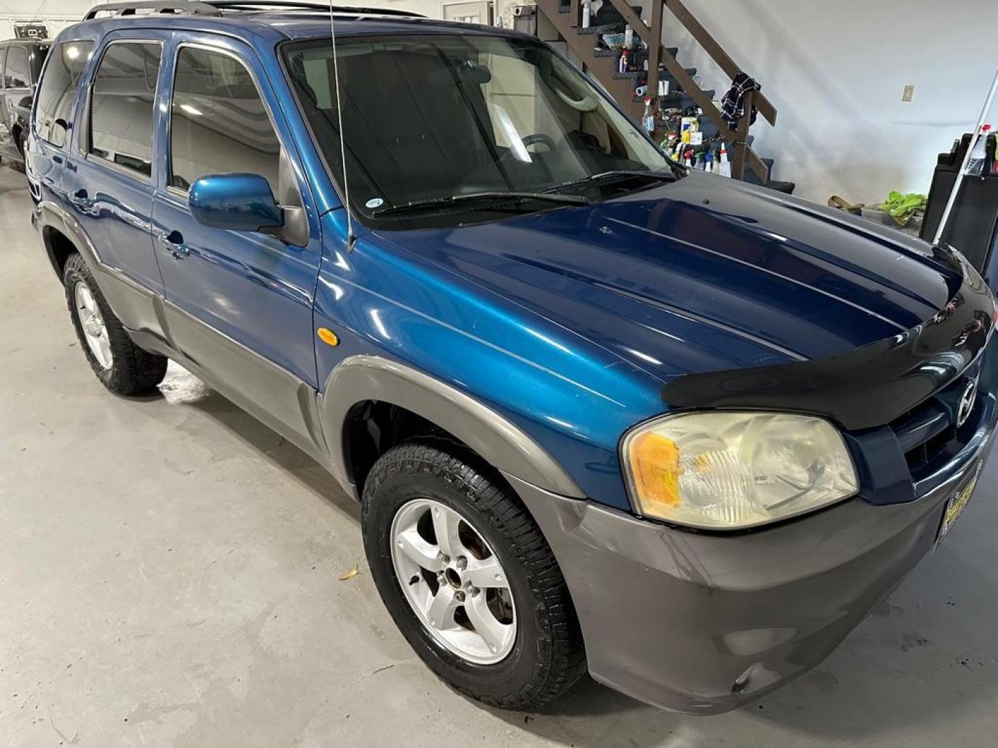 2005 BLUE MAZDA TRIBUTE S (4F2YZ04125K) with an 3.0L engine, Automatic transmission, located at 1030 S. 22nd St., Bismarck, ND, 58504, (701) 258-0022, 46.793560, -100.758118 - Photo#2