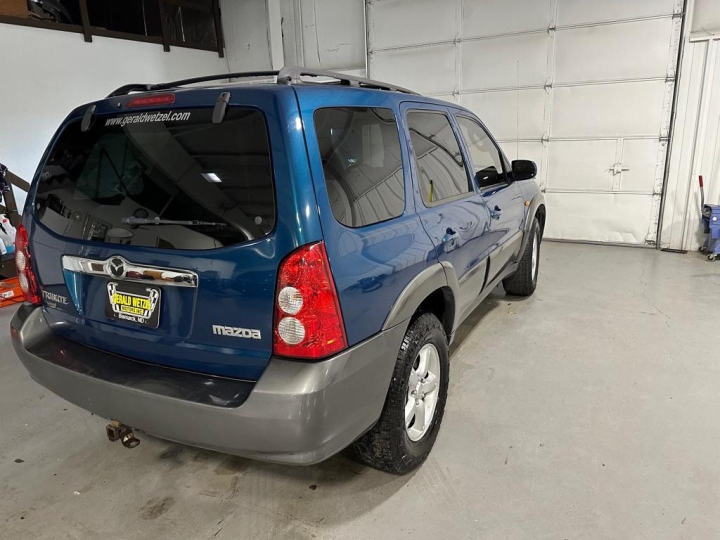 2005 BLUE MAZDA TRIBUTE S (4F2YZ04125K) with an 3.0L engine, Automatic transmission, located at 1030 S. 22nd St., Bismarck, ND, 58504, (701) 258-0022, 46.793560, -100.758118 - Photo#3