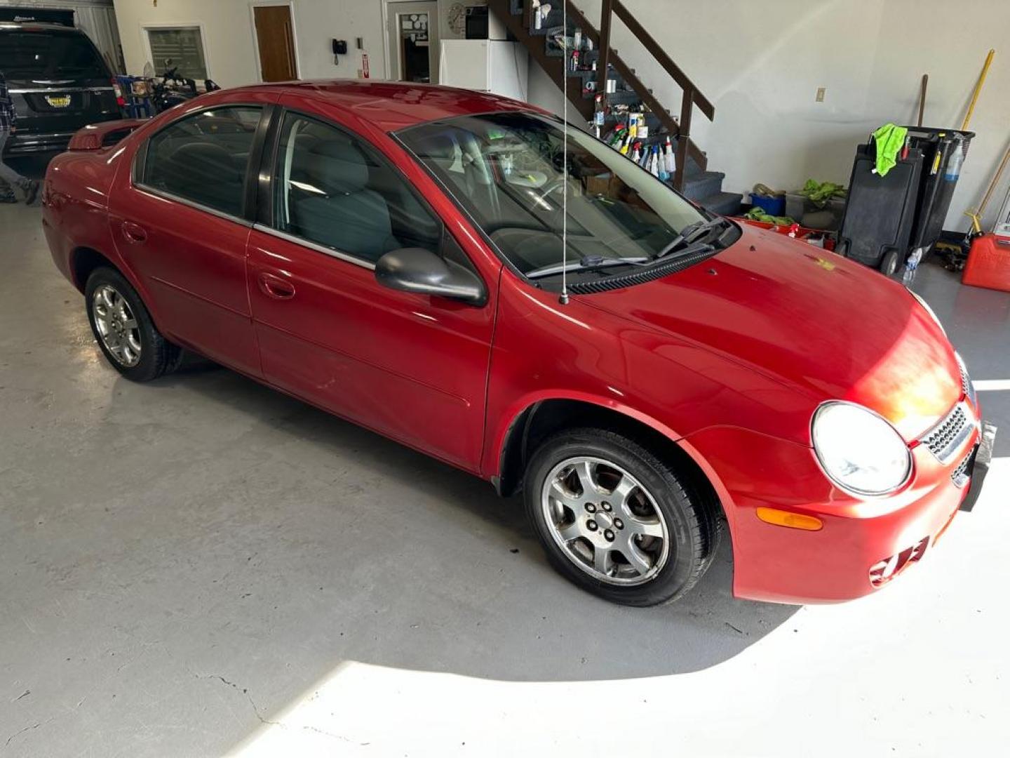 2005 RED DODGE NEON SXT (1B3ES56C15D) with an 2.0L engine, Automatic transmission, located at 1030 S. 22nd St., Bismarck, ND, 58504, (701) 258-0022, 46.793560, -100.758118 - Photo#2