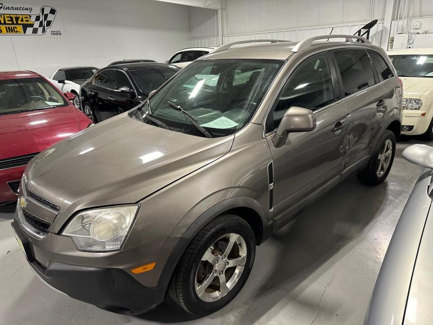 2012 BROWN CHEVROLET CAPTIVA SPORT (3GNAL2EK5CS) with an 2.4L engine, Automatic transmission, located at 1030 S. 22nd St., Bismarck, ND, 58504, (701) 258-0022, 46.793560, -100.758118 - 30 MPG - Photo#0