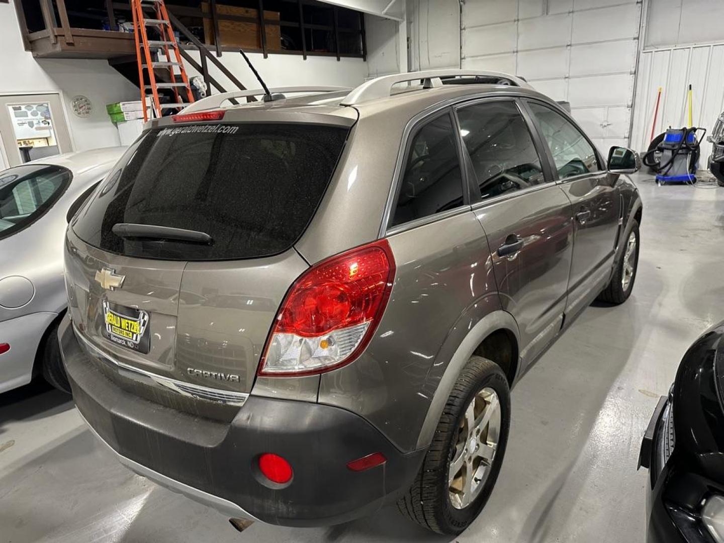 2012 BROWN CHEVROLET CAPTIVA SPORT (3GNAL2EK5CS) with an 2.4L engine, Automatic transmission, located at 1030 S. 22nd St., Bismarck, ND, 58504, (701) 258-0022, 46.793560, -100.758118 - 30 MPG - Photo#2