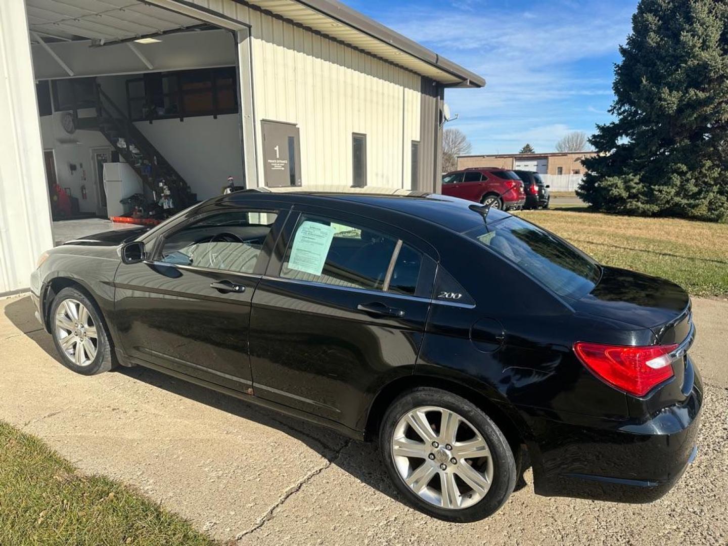 2013 BLACK CHRYSLER 200 TOURING (1C3CCBBB8DN) with an 2.4L engine, Automatic transmission, located at 1030 S. 22nd St., Bismarck, ND, 58504, (701) 258-0022, 46.793560, -100.758118 - Photo#0