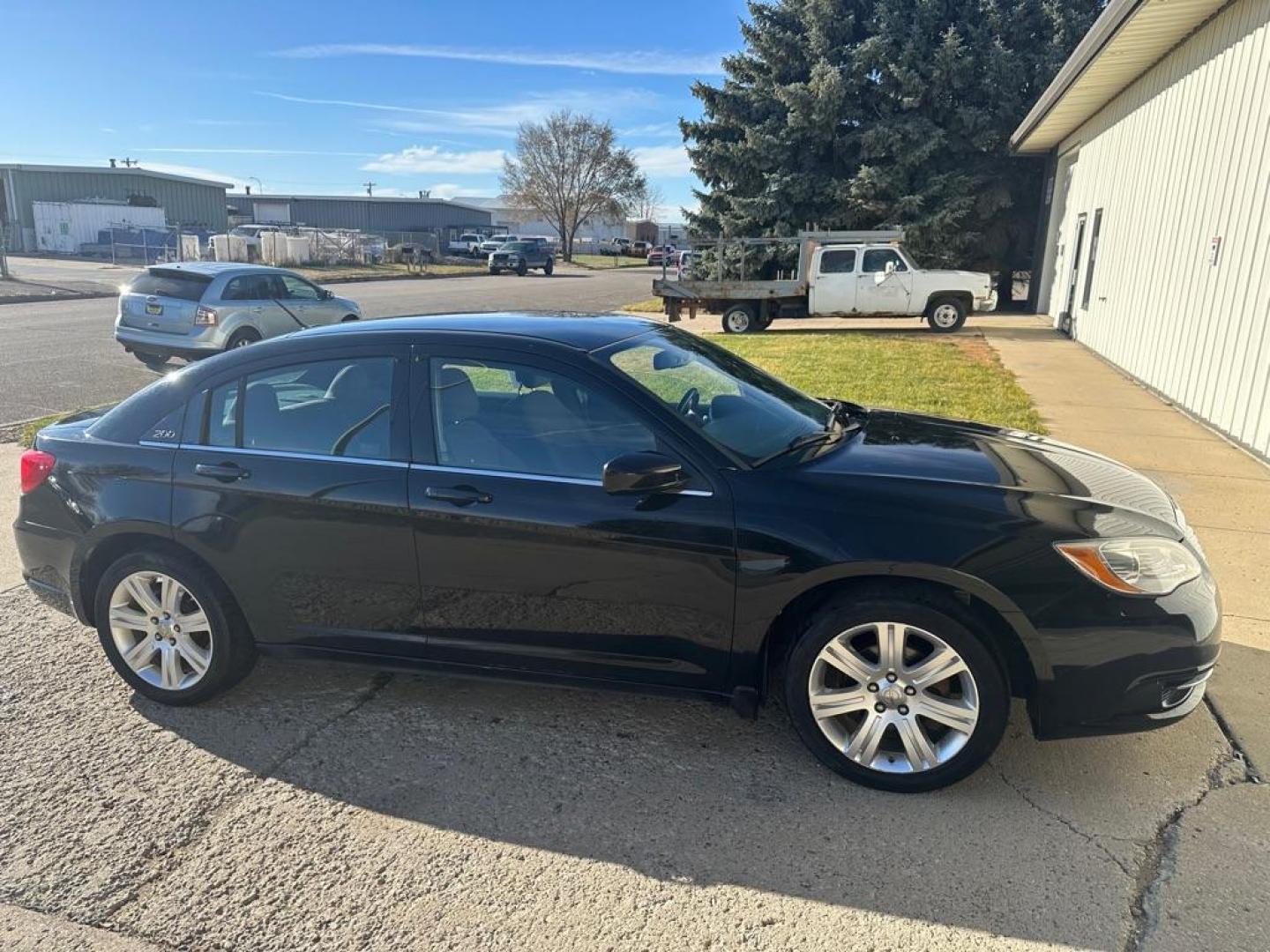 2013 BLACK CHRYSLER 200 TOURING (1C3CCBBB8DN) with an 2.4L engine, Automatic transmission, located at 1030 S. 22nd St., Bismarck, ND, 58504, (701) 258-0022, 46.793560, -100.758118 - Photo#1