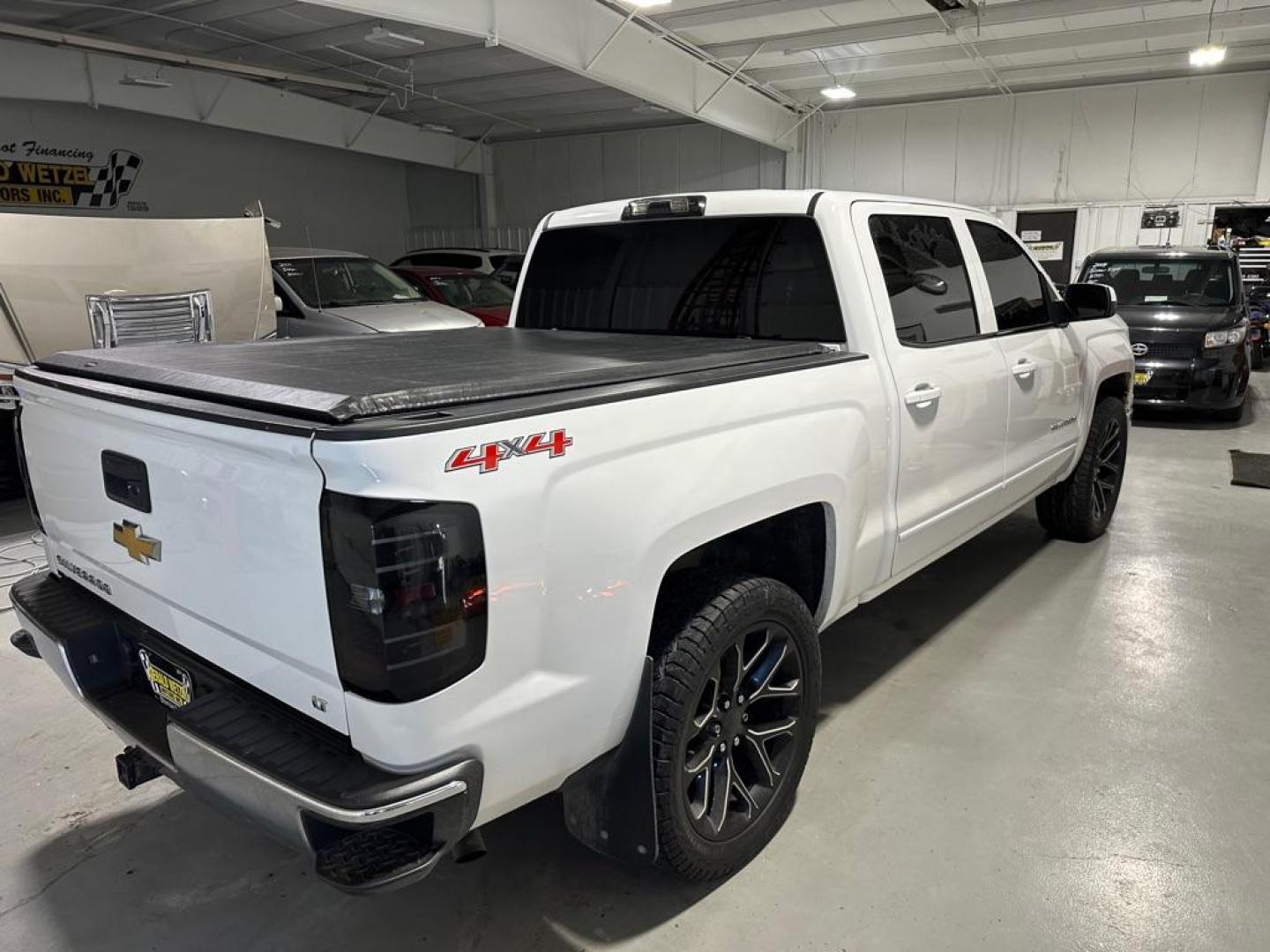 2015 WHITE CHEVROLET SILVERADO 1500 LT (3GCUKREC0FG) with an 5.3L engine, Automatic transmission, located at 1030 S. 22nd St., Bismarck, ND, 58504, (701) 258-0022, 46.793560, -100.758118 - Photo#2