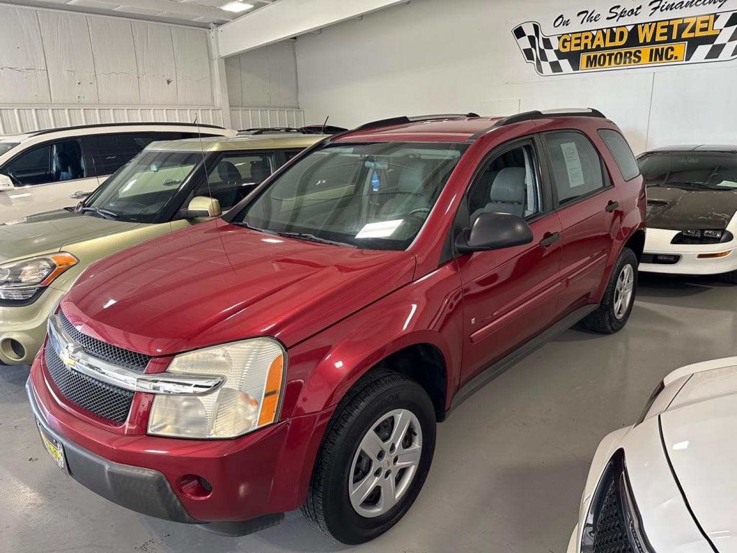 2006 RED CHEVROLET EQUINOX LS (2CNDL13F266) with an 3.4L engine, Automatic transmission, located at 1030 S. 22nd St., Bismarck, ND, 58504, (701) 258-0022, 46.793560, -100.758118 - NICE CLEAN EQUINOX. WELL MAINTAINED - Photo#2